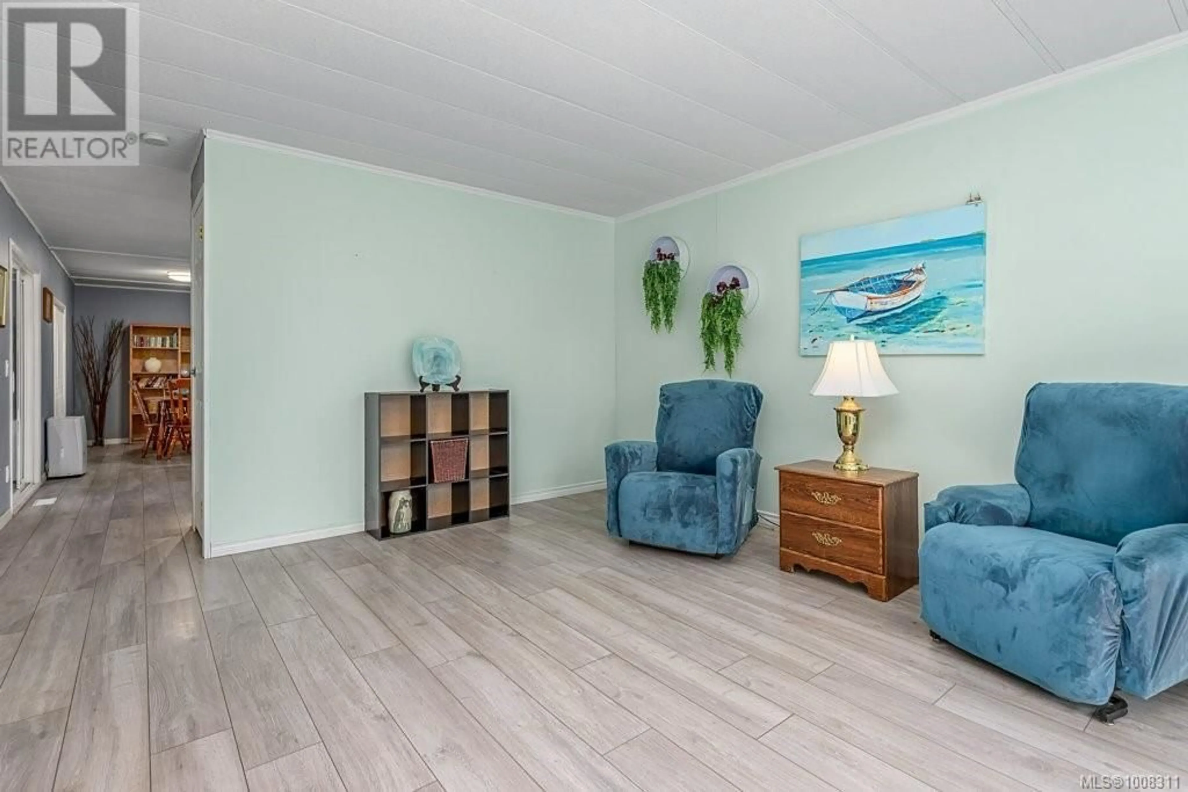 Living room with furniture, wood/laminate floor for 2340 6TH STREET EAST, Courtenay British Columbia V9N7R9