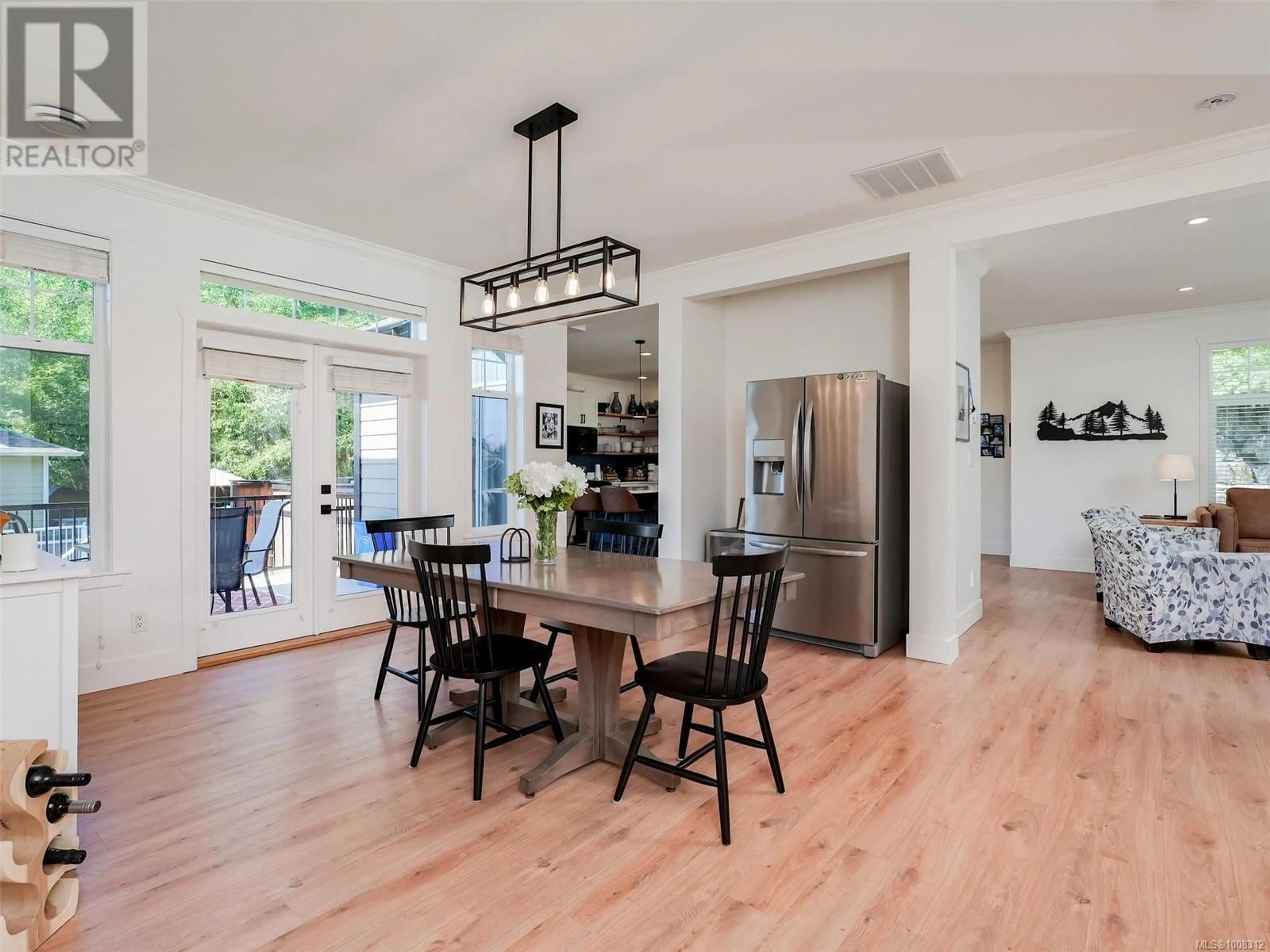 Open concept kitchen, wood/laminate floor for 6460 WILLOWPARK WAY, Sooke British Columbia V9Z1J9