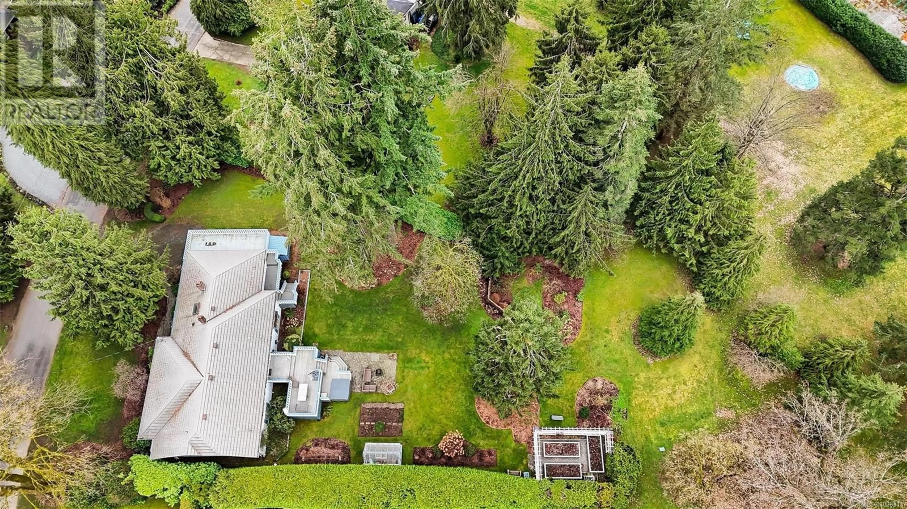 A pic from outside/outdoor area/front of a property/back of a property/a pic from drone, forest/trees view for 4758 FAIRBRIDGE DRIVE, Duncan British Columbia V9L6N8