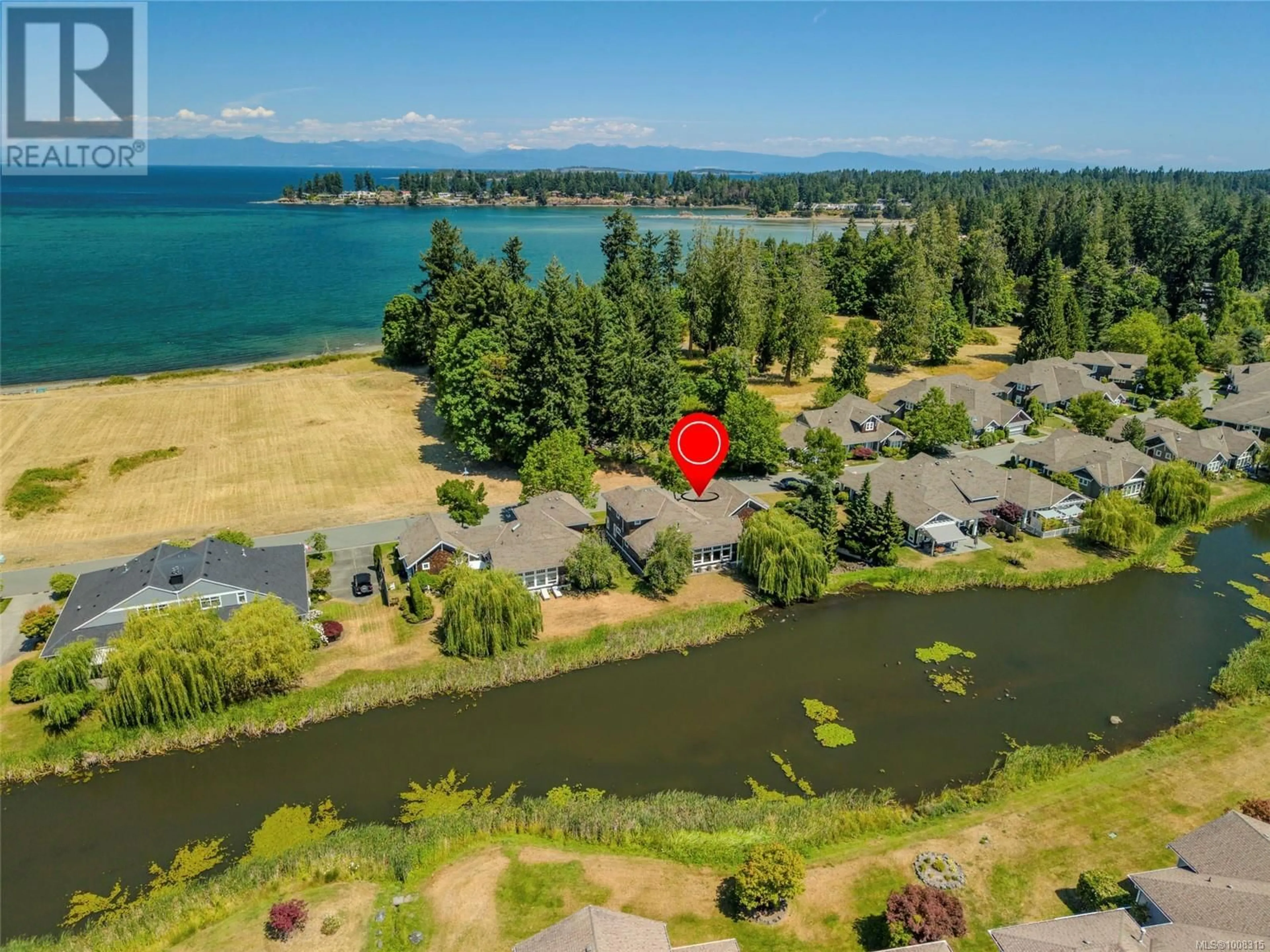A pic from outside/outdoor area/front of a property/back of a property/a pic from drone, water/lake/river/ocean view for 1336 SALTSPRING PLACE, Parksville British Columbia V9P2X7