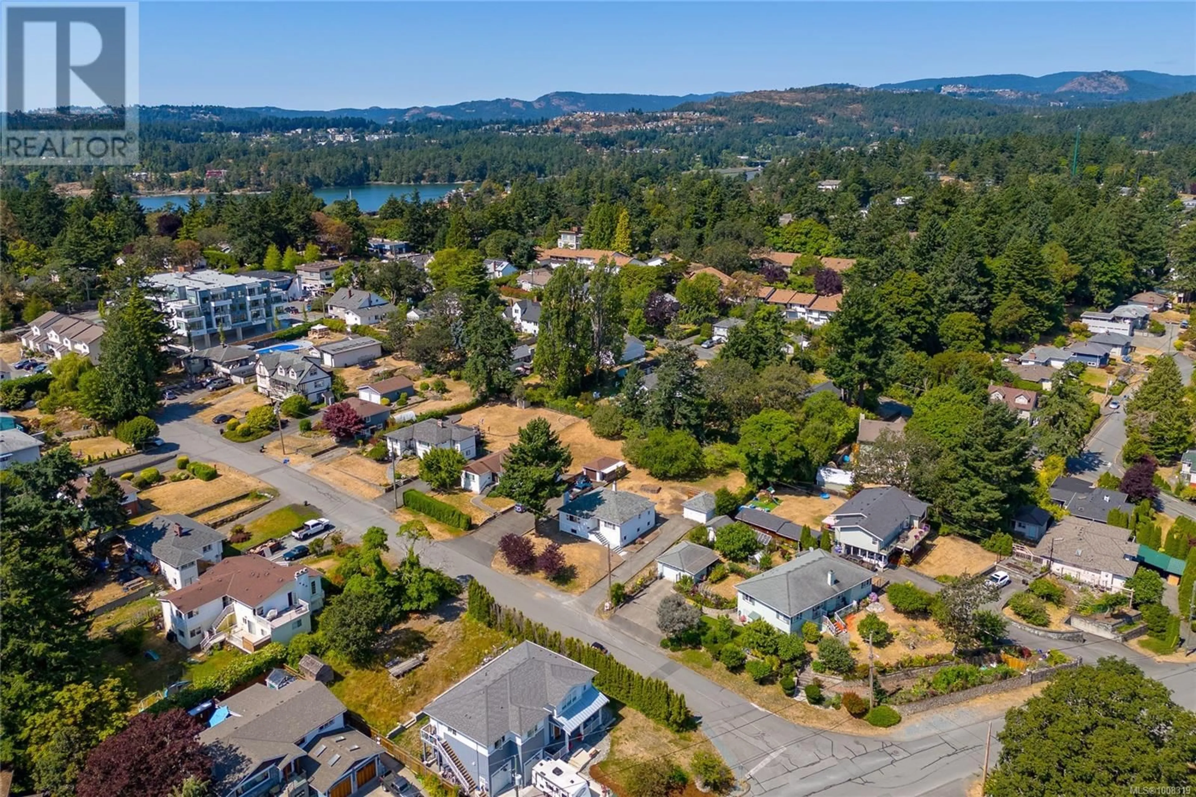 A pic from outside/outdoor area/front of a property/back of a property/a pic from drone, water/lake/river/ocean view for 210 SUZANNE PLACE, View Royal British Columbia V9B1P1