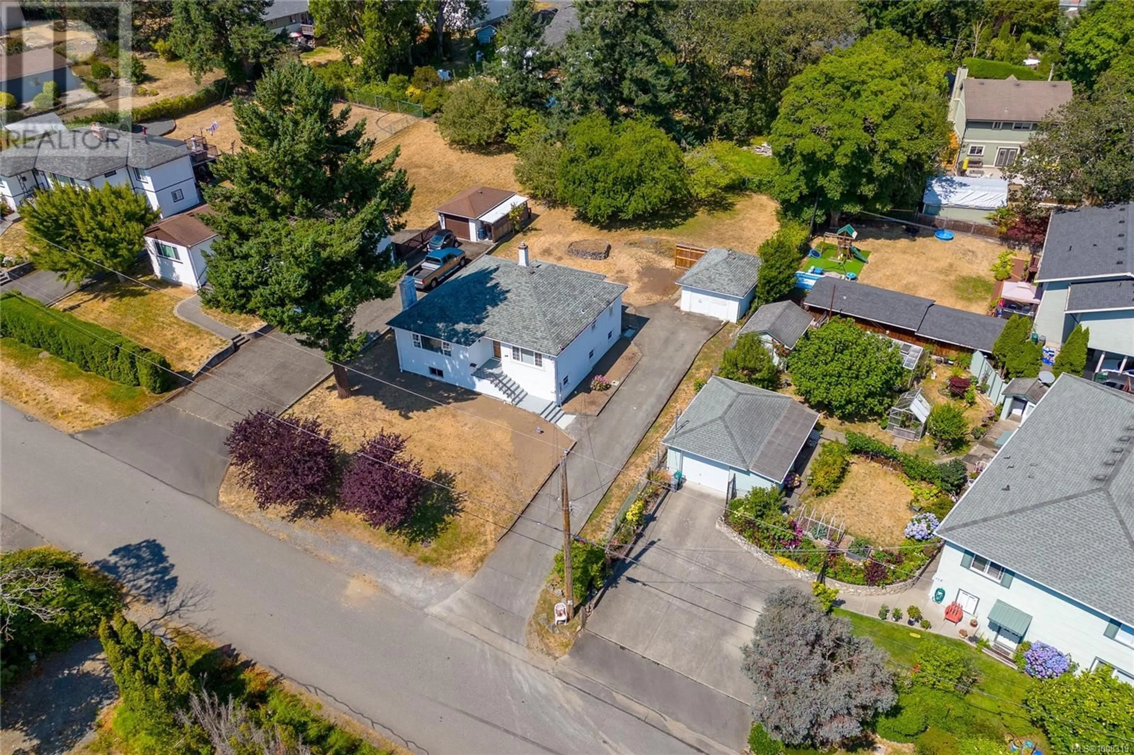A pic from outside/outdoor area/front of a property/back of a property/a pic from drone, street for 210 SUZANNE PLACE, View Royal British Columbia V9B1P1