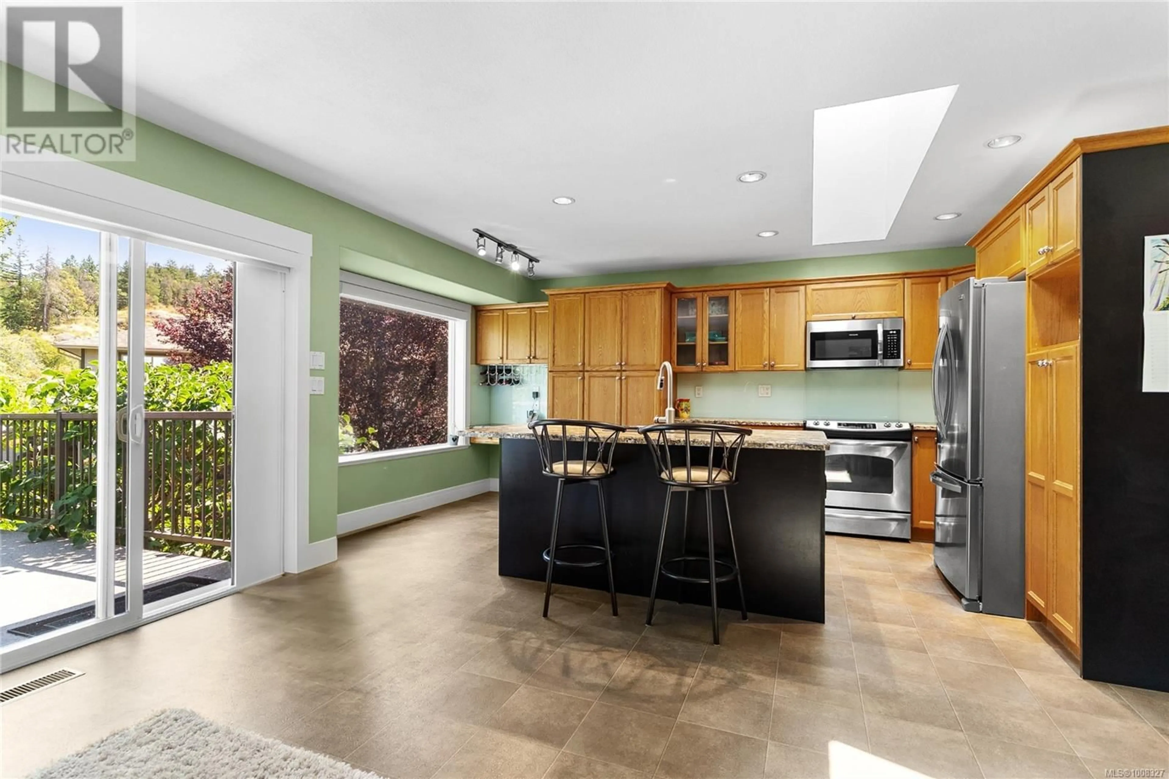 Open concept kitchen, ceramic/tile floor for 5118 BROADMOOR PLACE, Nanaimo British Columbia V9T6N5