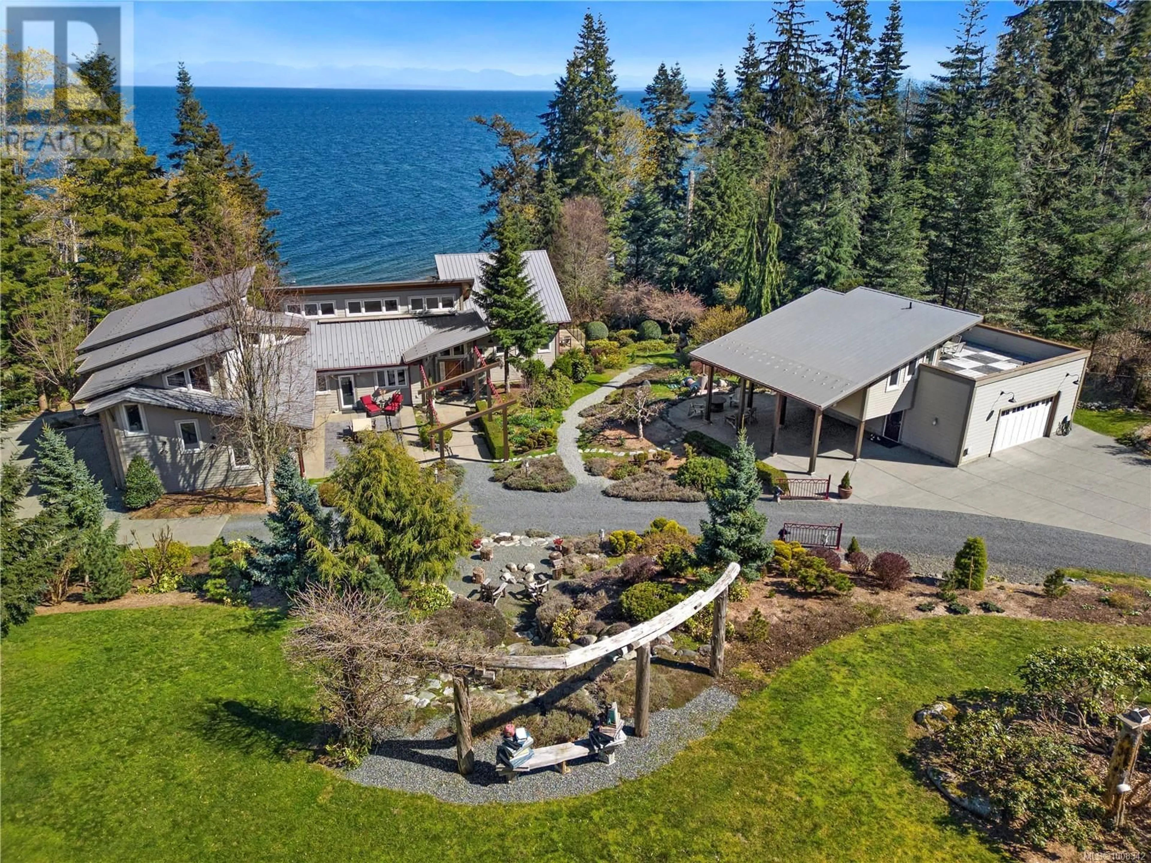 A pic from outside/outdoor area/front of a property/back of a property/a pic from drone, water/lake/river/ocean view for 6520 EAGLES DRIVE, Courtenay British Columbia V9J1V4