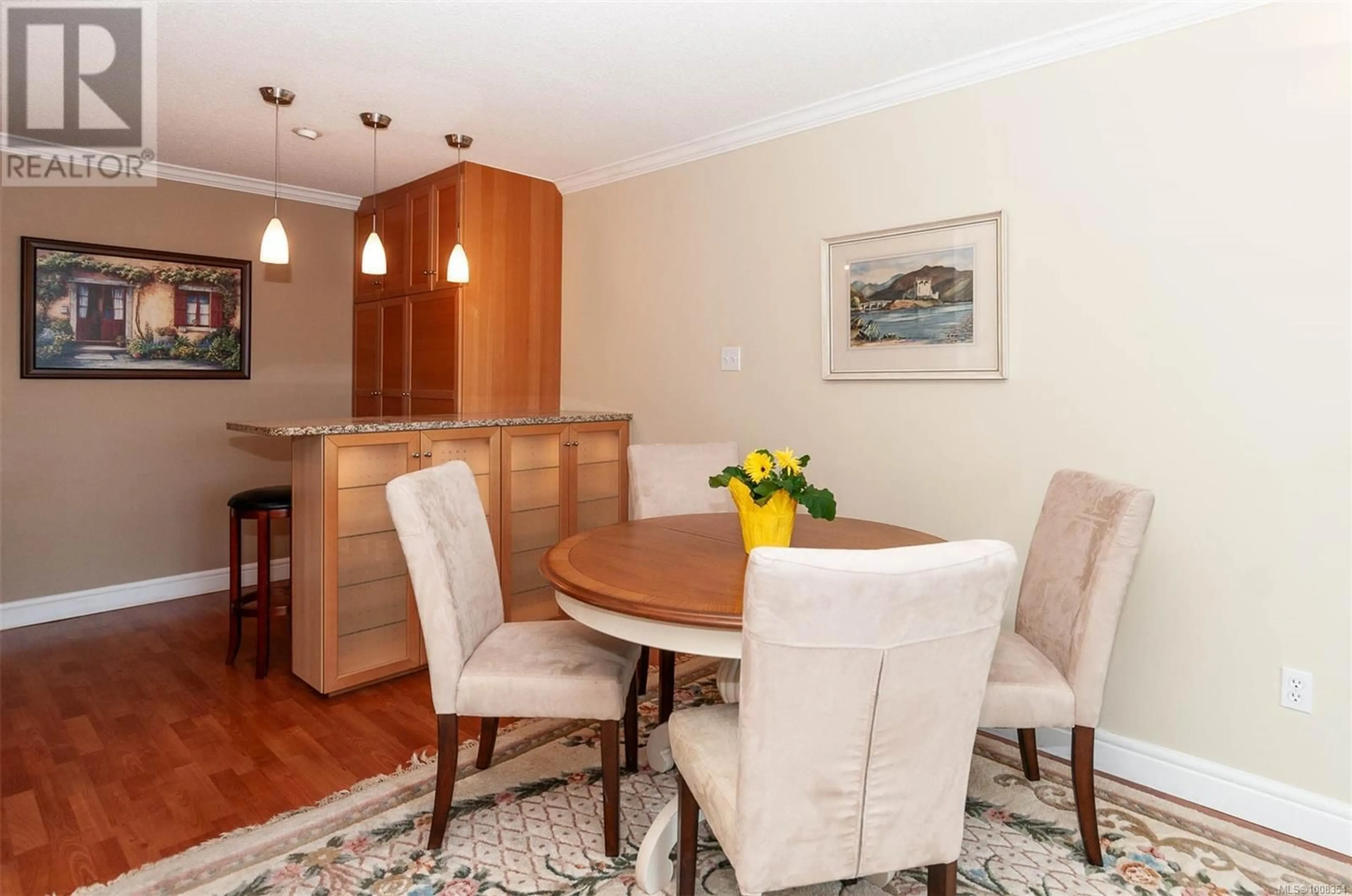 Dining room, wood/laminate floor for 302 - 1024 FAIRFIELD ROAD, Victoria British Columbia V8V3A5