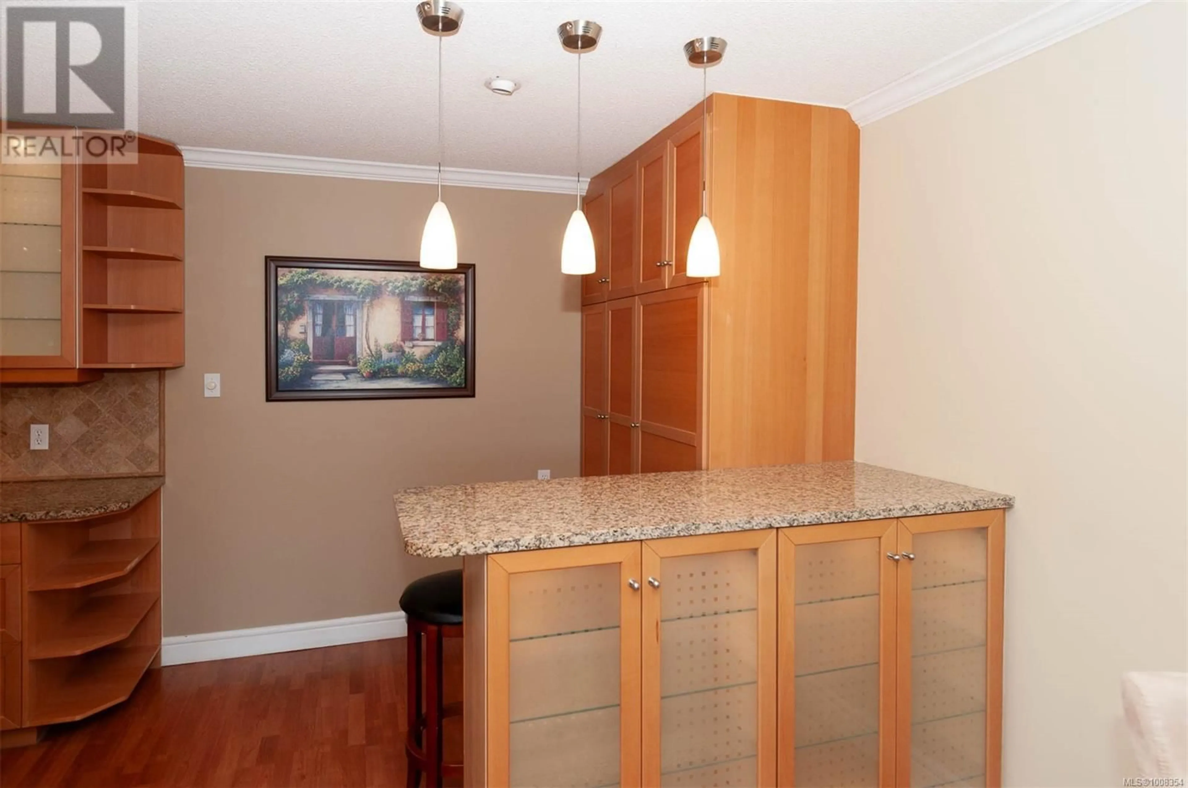 Open concept kitchen, wood/laminate floor for 302 - 1024 FAIRFIELD ROAD, Victoria British Columbia V8V3A5
