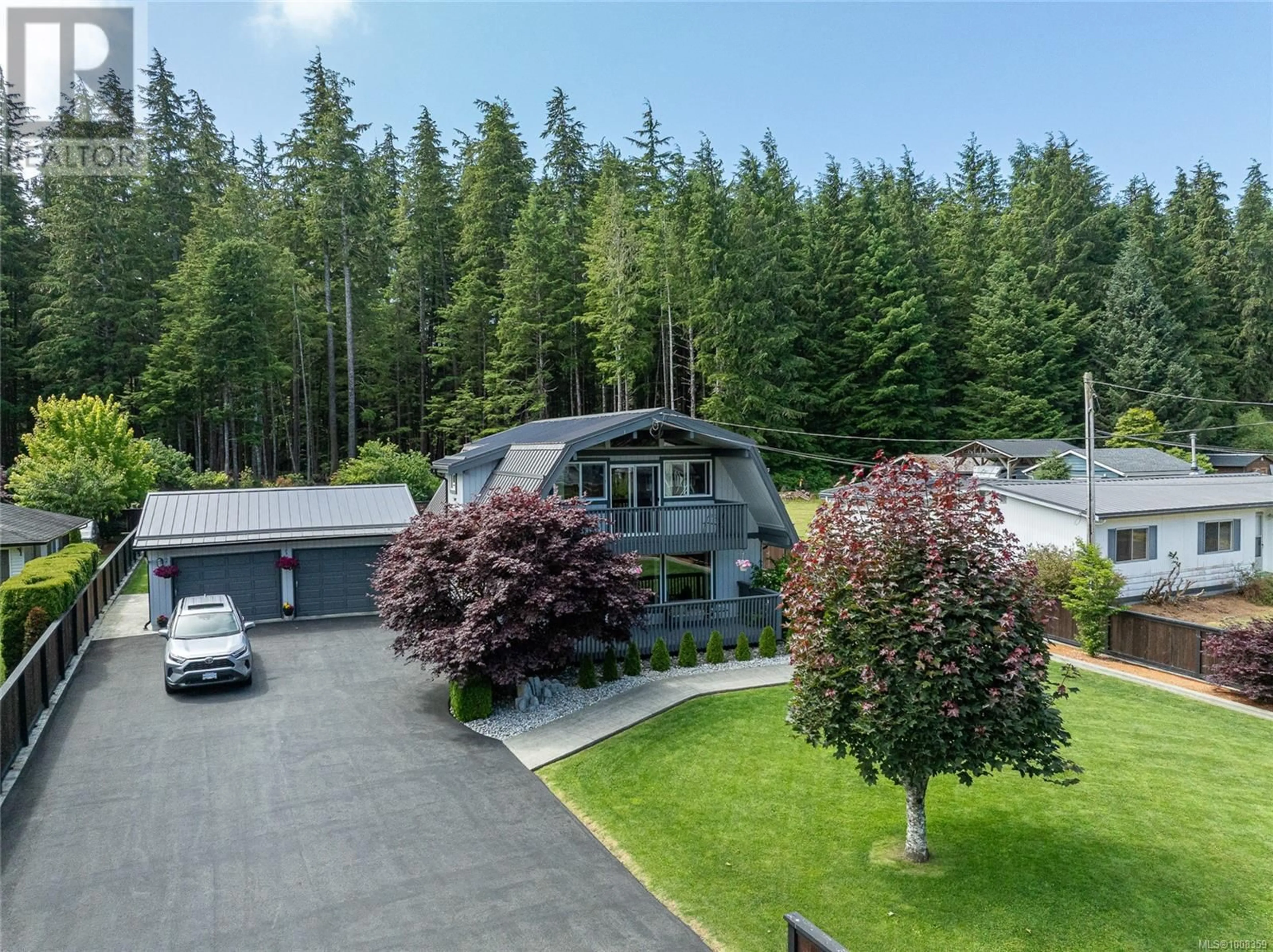 A pic from outside/outdoor area/front of a property/back of a property/a pic from drone, forest/trees view for 5830 BEAVER HARBOUR ROAD, Port Hardy British Columbia V0N2P0