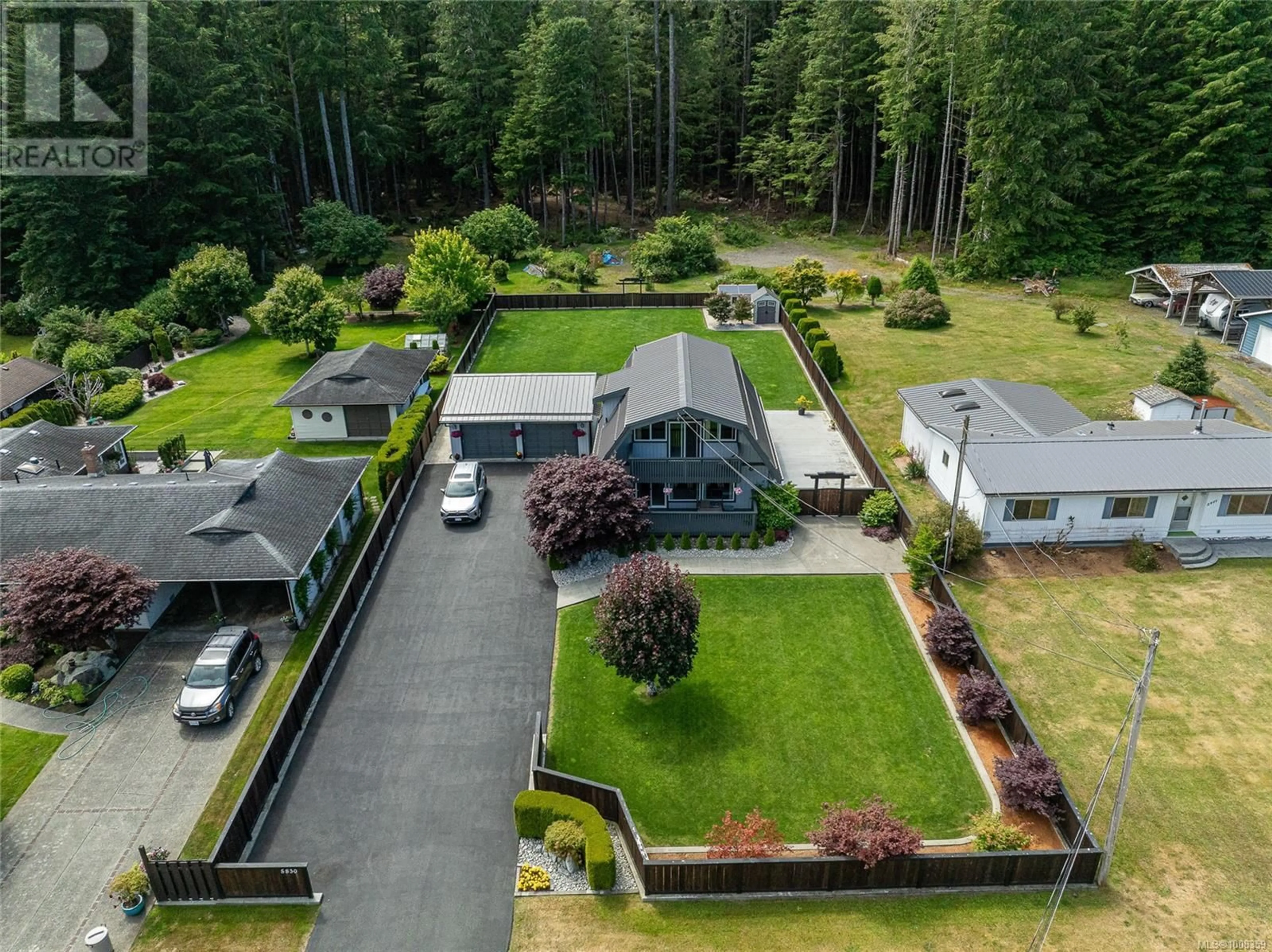 A pic from outside/outdoor area/front of a property/back of a property/a pic from drone, unknown for 5830 BEAVER HARBOUR ROAD, Port Hardy British Columbia V0N2P0