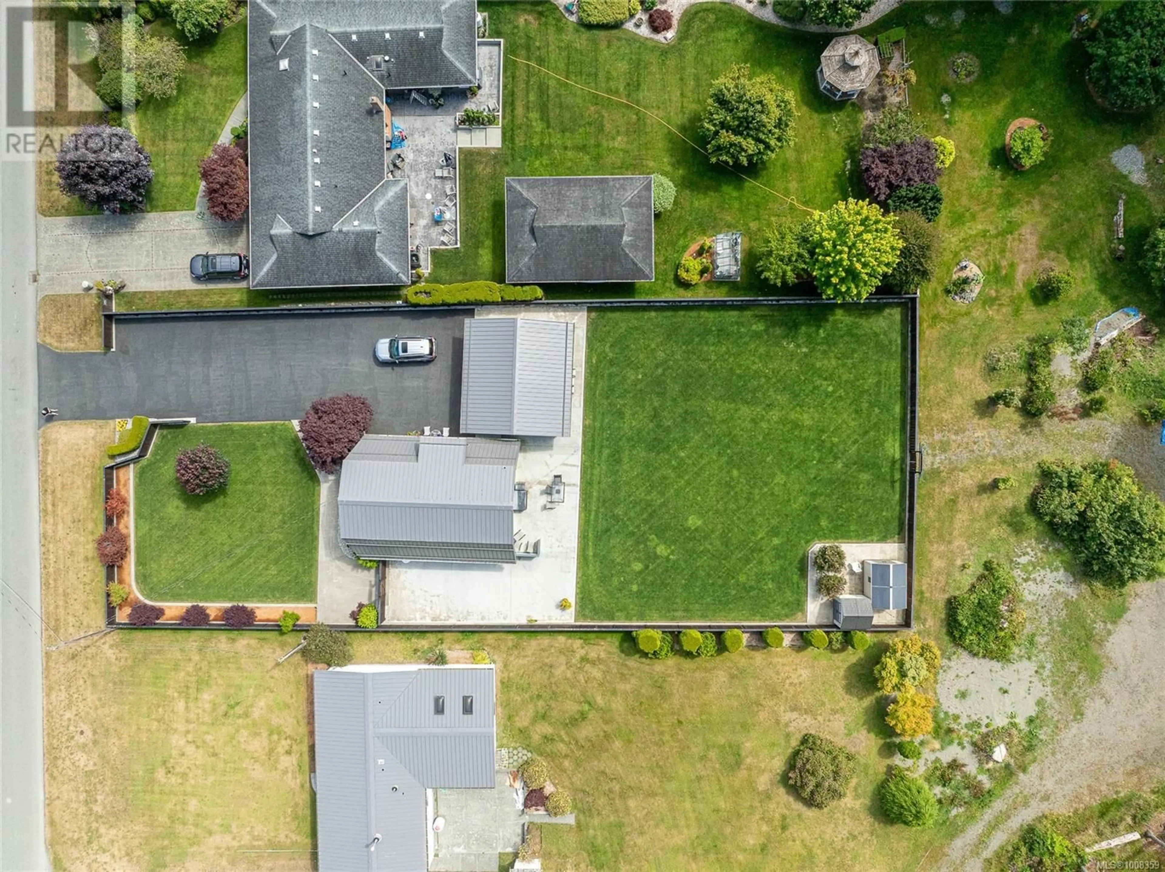 A pic from outside/outdoor area/front of a property/back of a property/a pic from drone, street for 5830 BEAVER HARBOUR ROAD, Port Hardy British Columbia V0N2P0