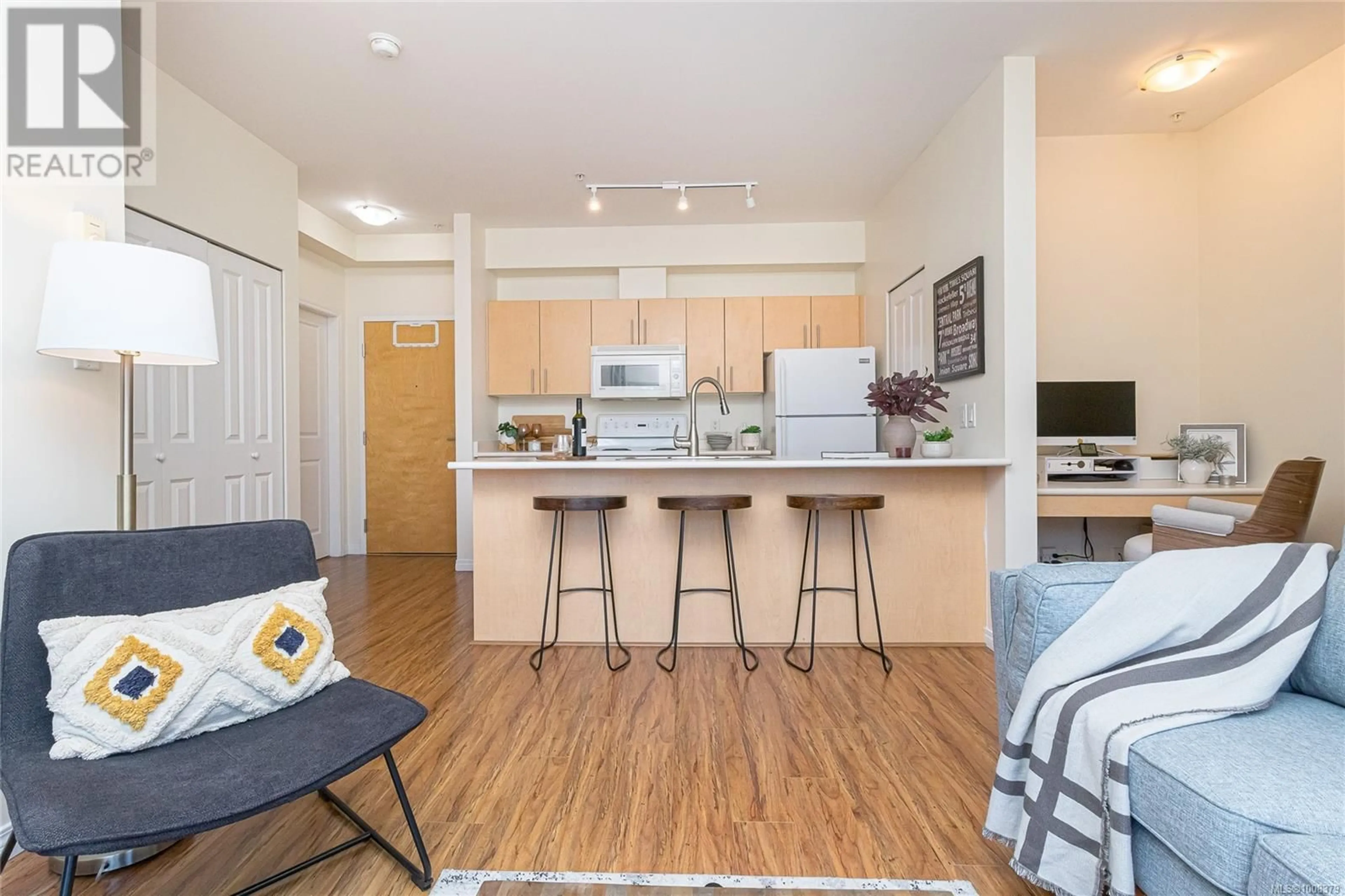 Open concept kitchen, wood/laminate floor for 315 - 1550 CHURCH AVENUE, Saanich British Columbia V8P2H1