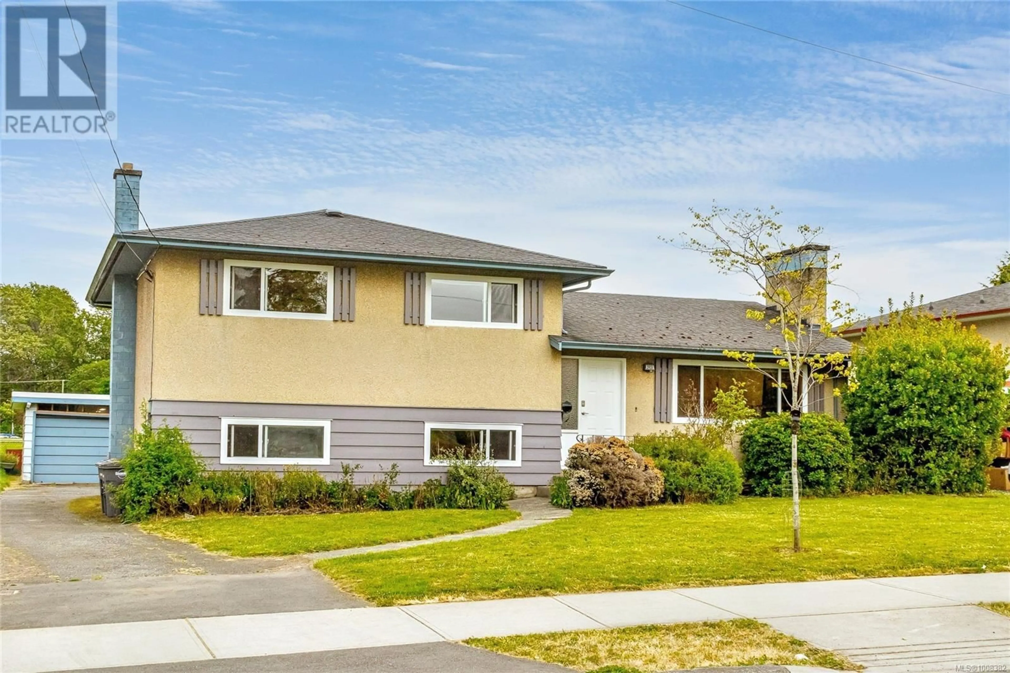 Home with vinyl exterior material, street for 3931 ANSELL ROAD, Saanich British Columbia V8P4W1