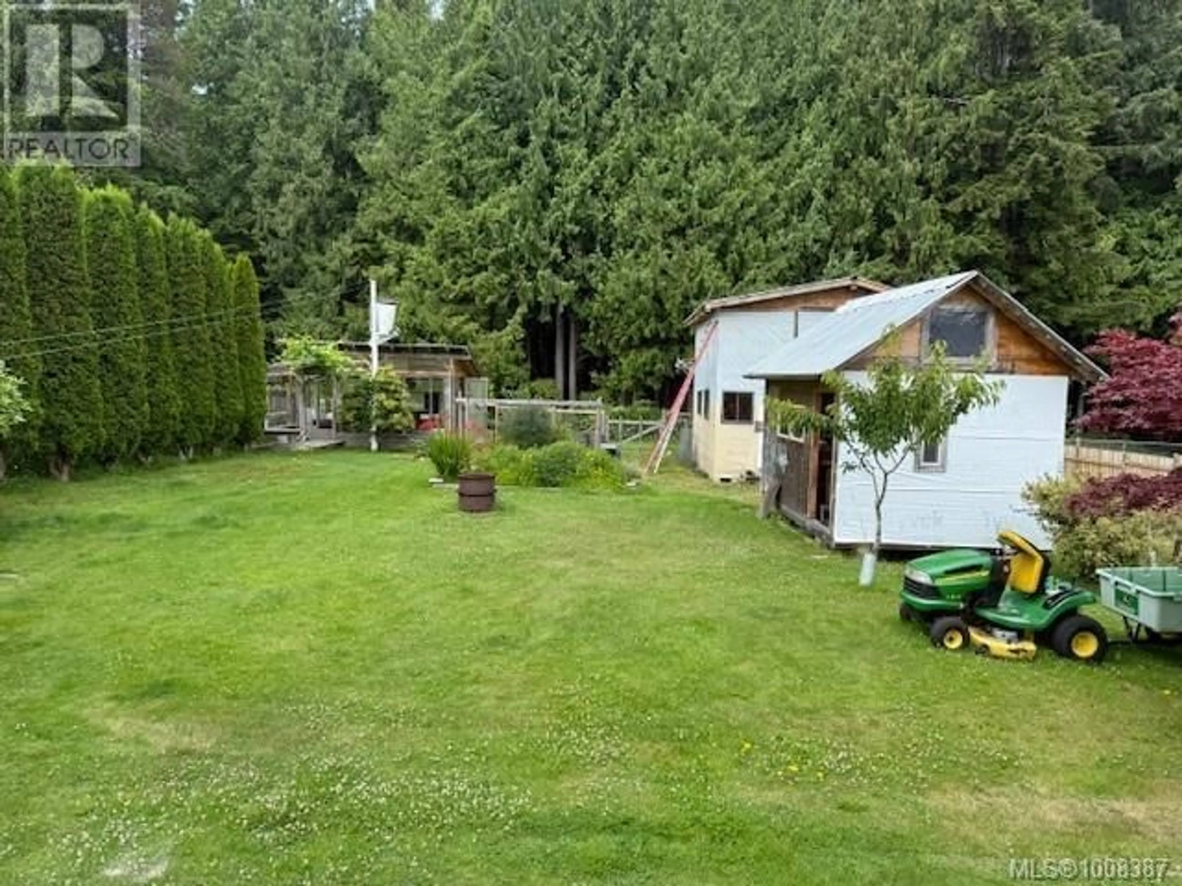 A pic from outside/outdoor area/front of a property/back of a property/a pic from drone, forest/trees view for 4520 BYNG ROAD, Port Hardy British Columbia V0N2P0