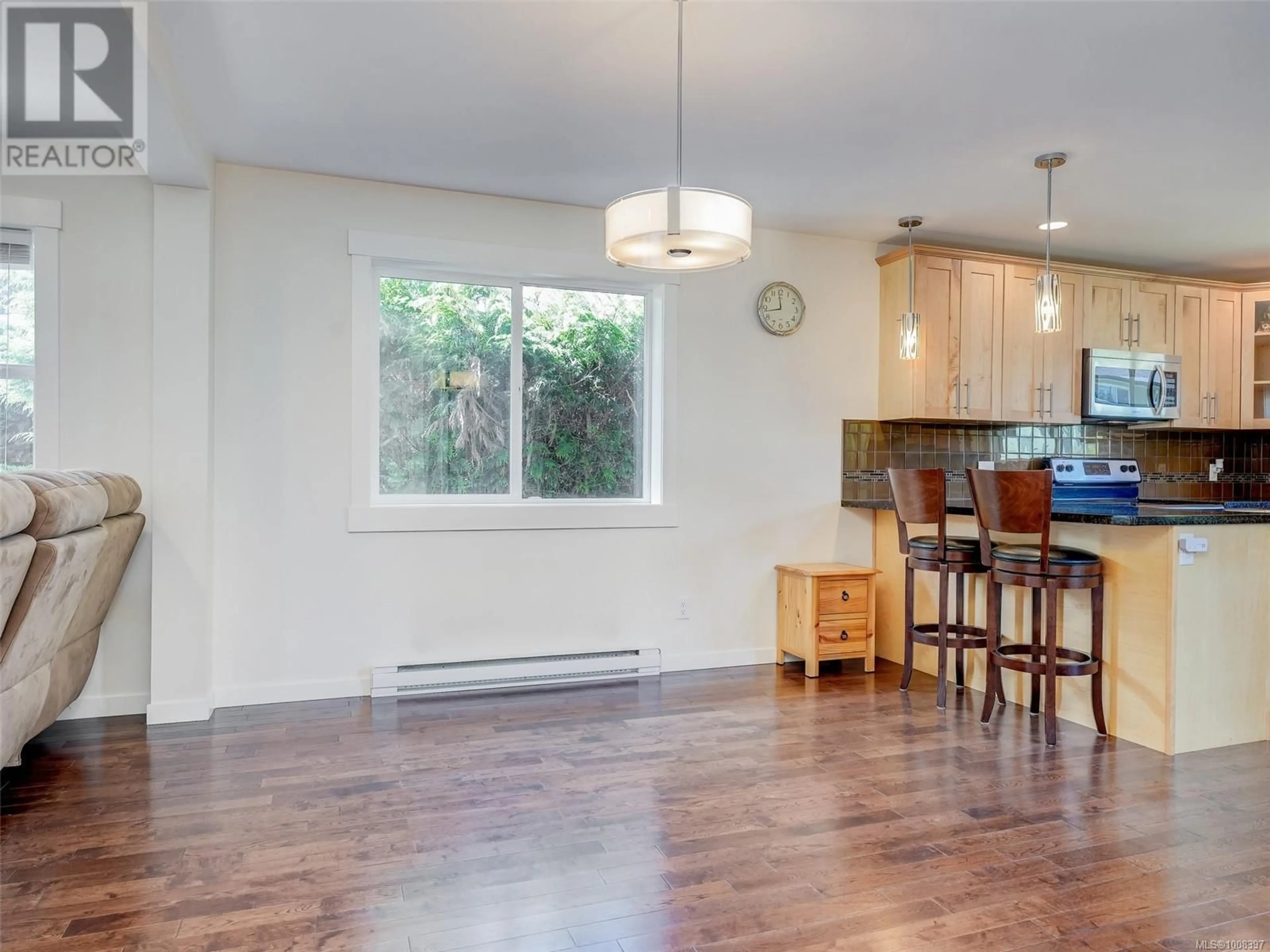 Open concept kitchen, wood/laminate floor for 1026 TILLICUM ROAD, Esquimalt British Columbia V9A2A1