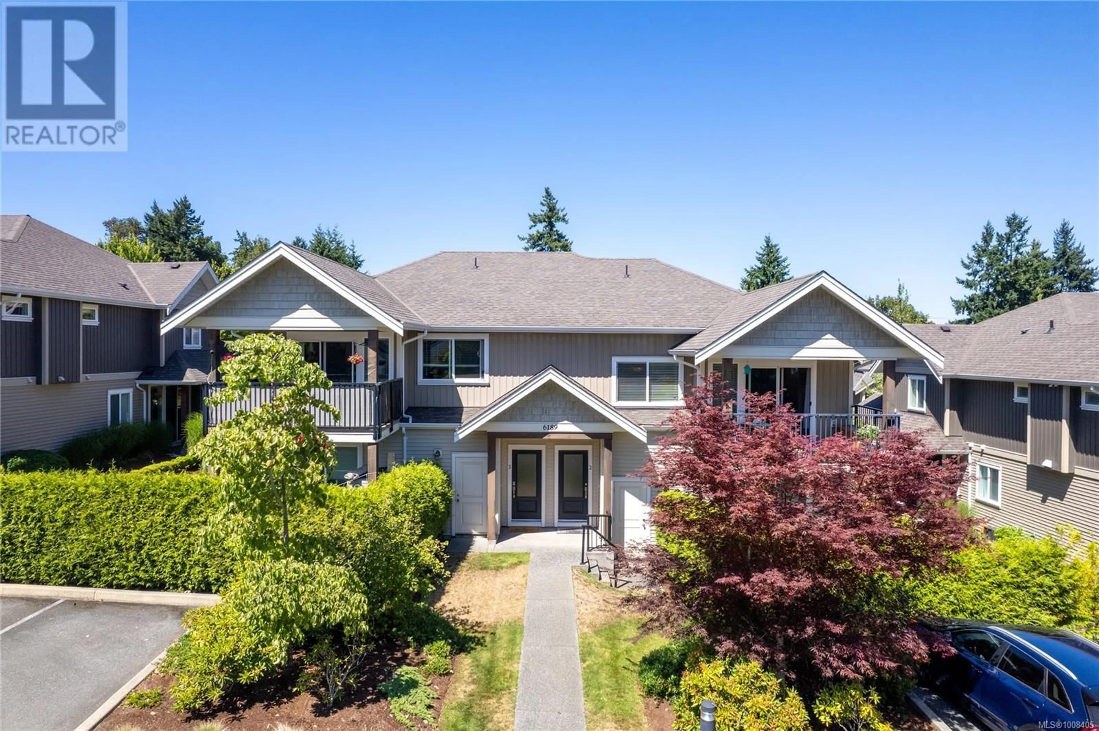 A pic from outside/outdoor area/front of a property/back of a property/a pic from drone, unknown for 2 - 6189 NITINAT WAY, Nanaimo British Columbia V9V0A9