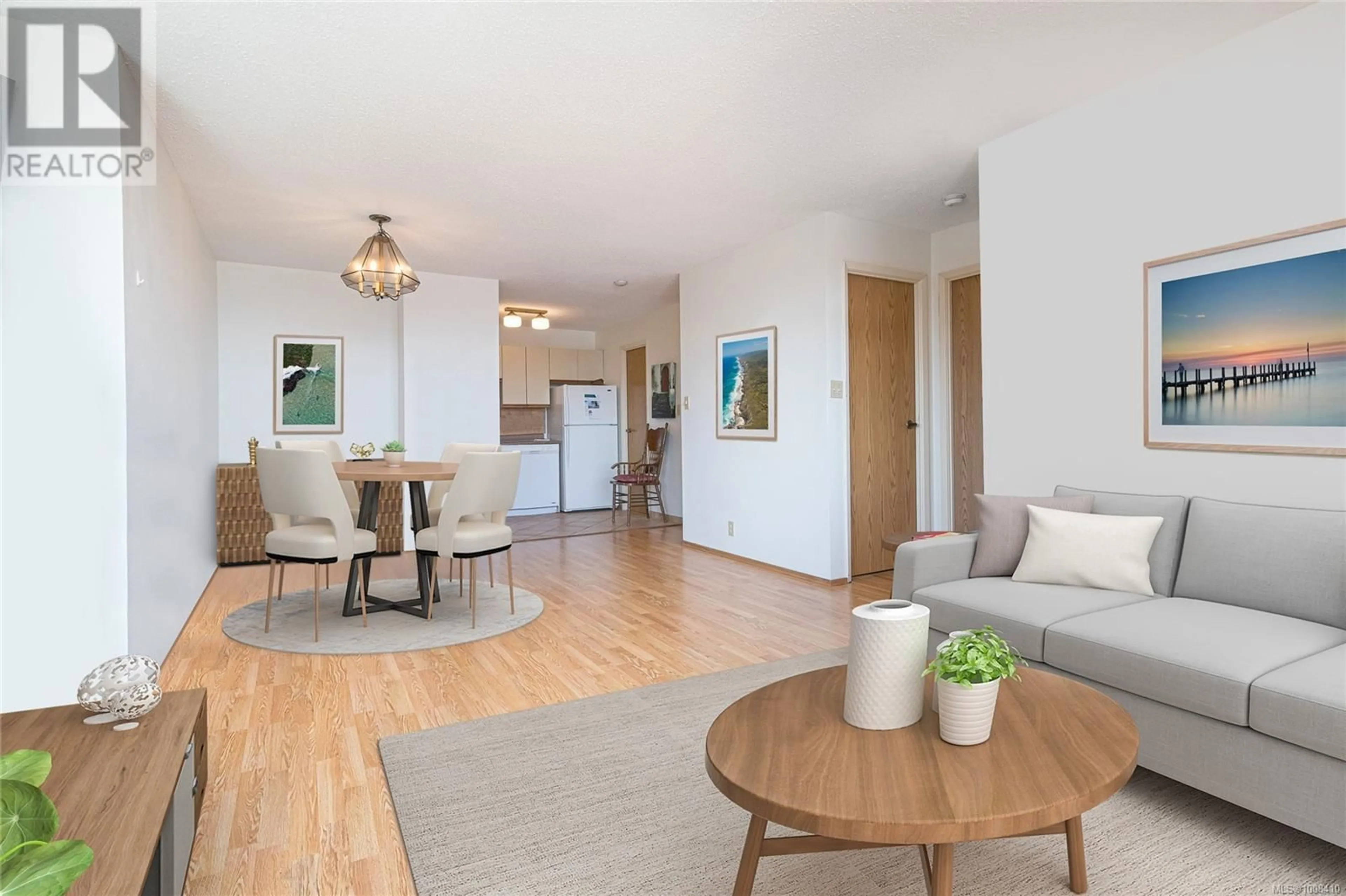 Living room with furniture, wood/laminate floor for 809 - 1630 QUADRA STREET, Victoria British Columbia V8W3J5