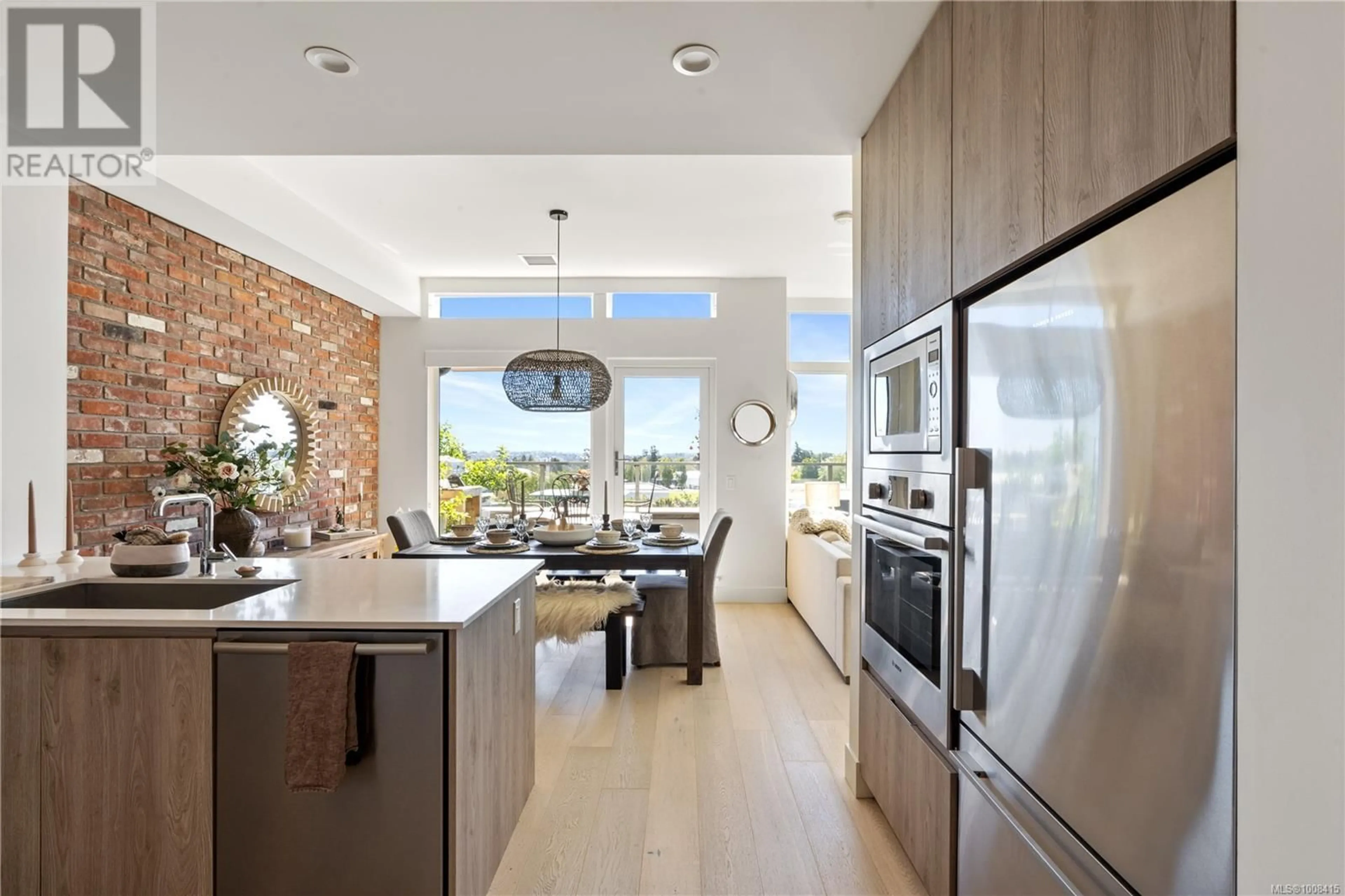 Open concept kitchen, ceramic/tile floor for 503 - 1216 CARLISLE AVENUE, Esquimalt British Columbia V9A0H5