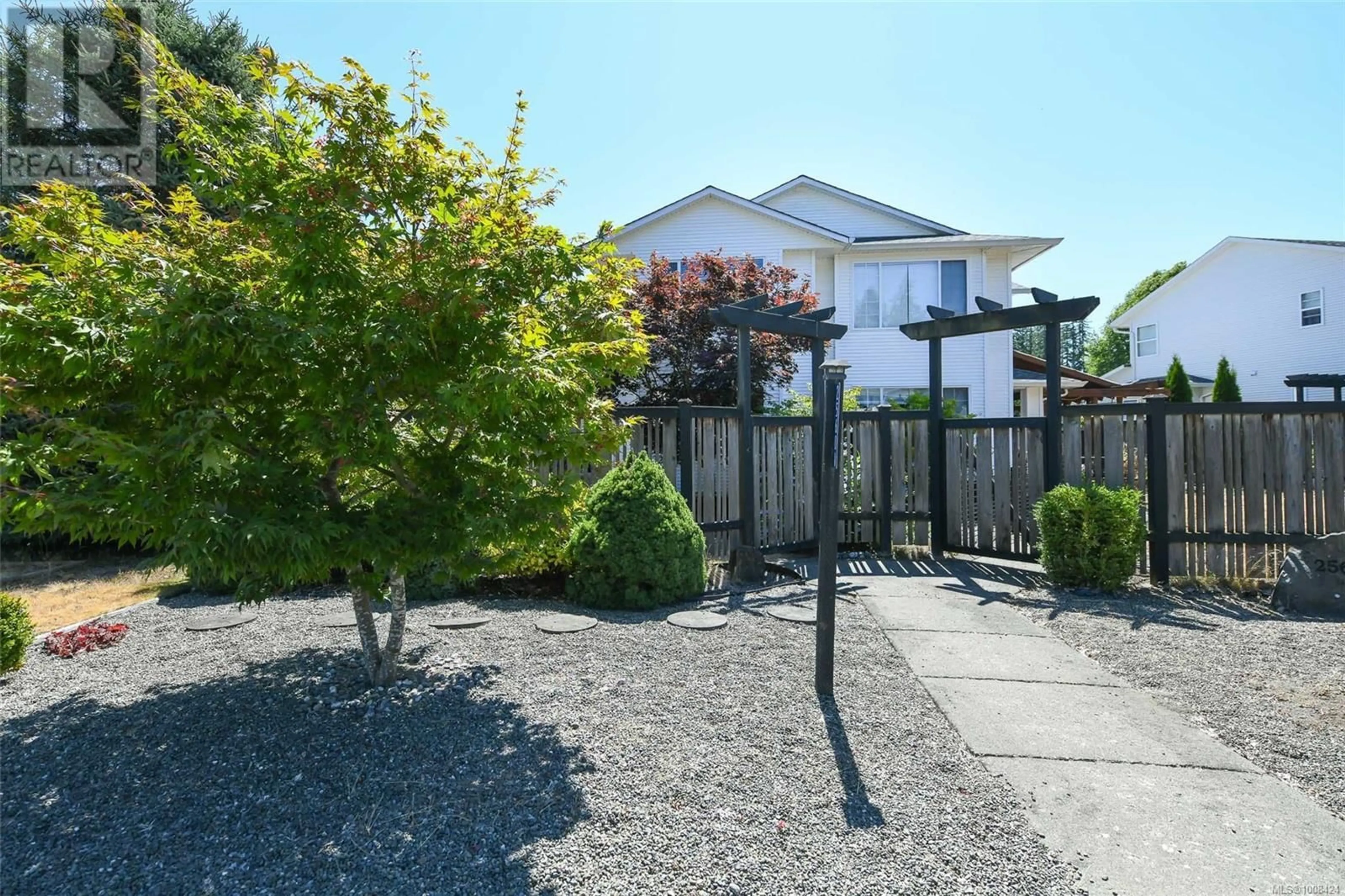A pic from outside/outdoor area/front of a property/back of a property/a pic from drone, street for A - 2560 1ST STREET, Courtenay British Columbia V9N8Z3