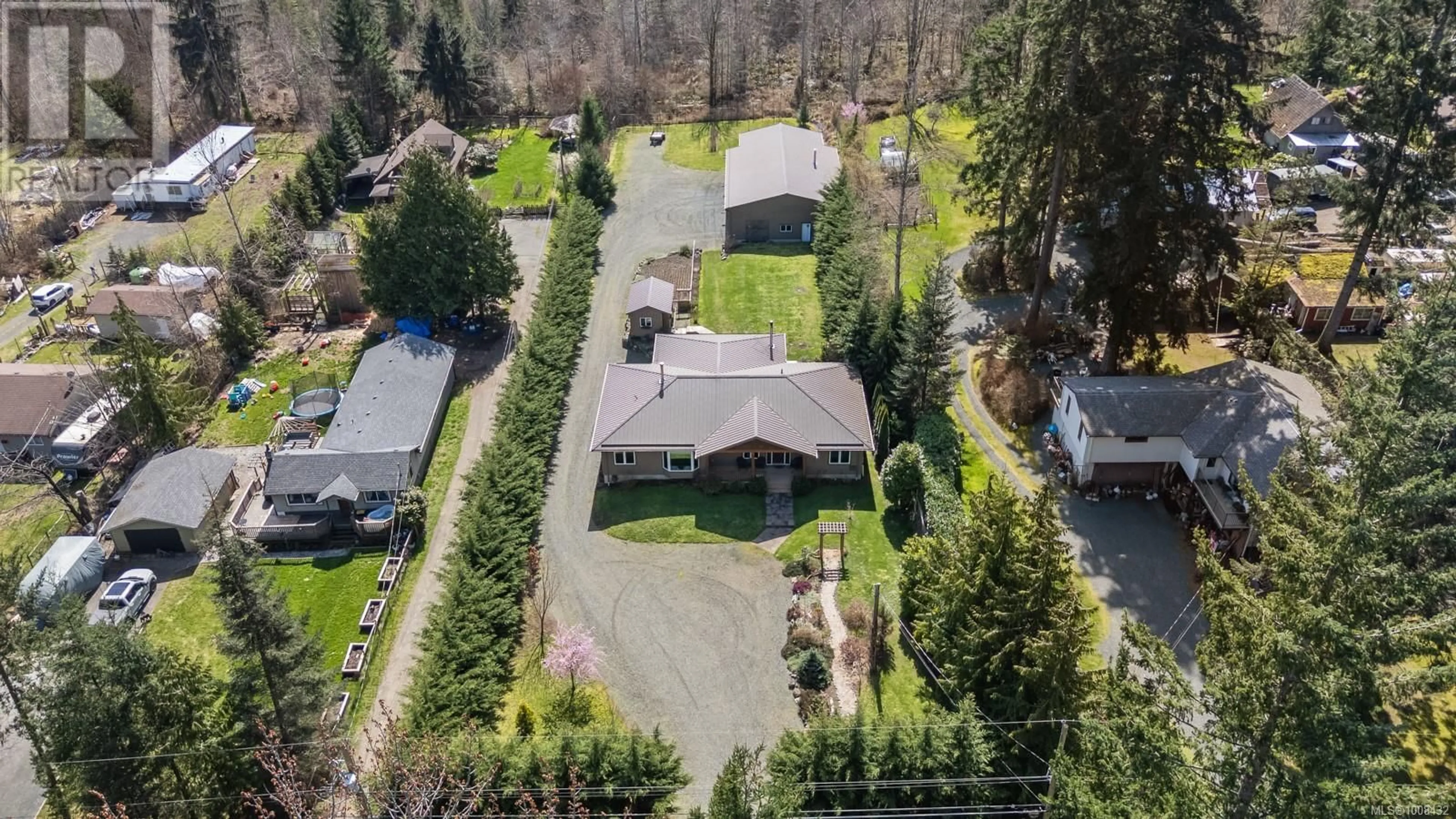 A pic from outside/outdoor area/front of a property/back of a property/a pic from drone, street for 2353 CATHERWOOD ROAD, Black Creek British Columbia V9J1J3