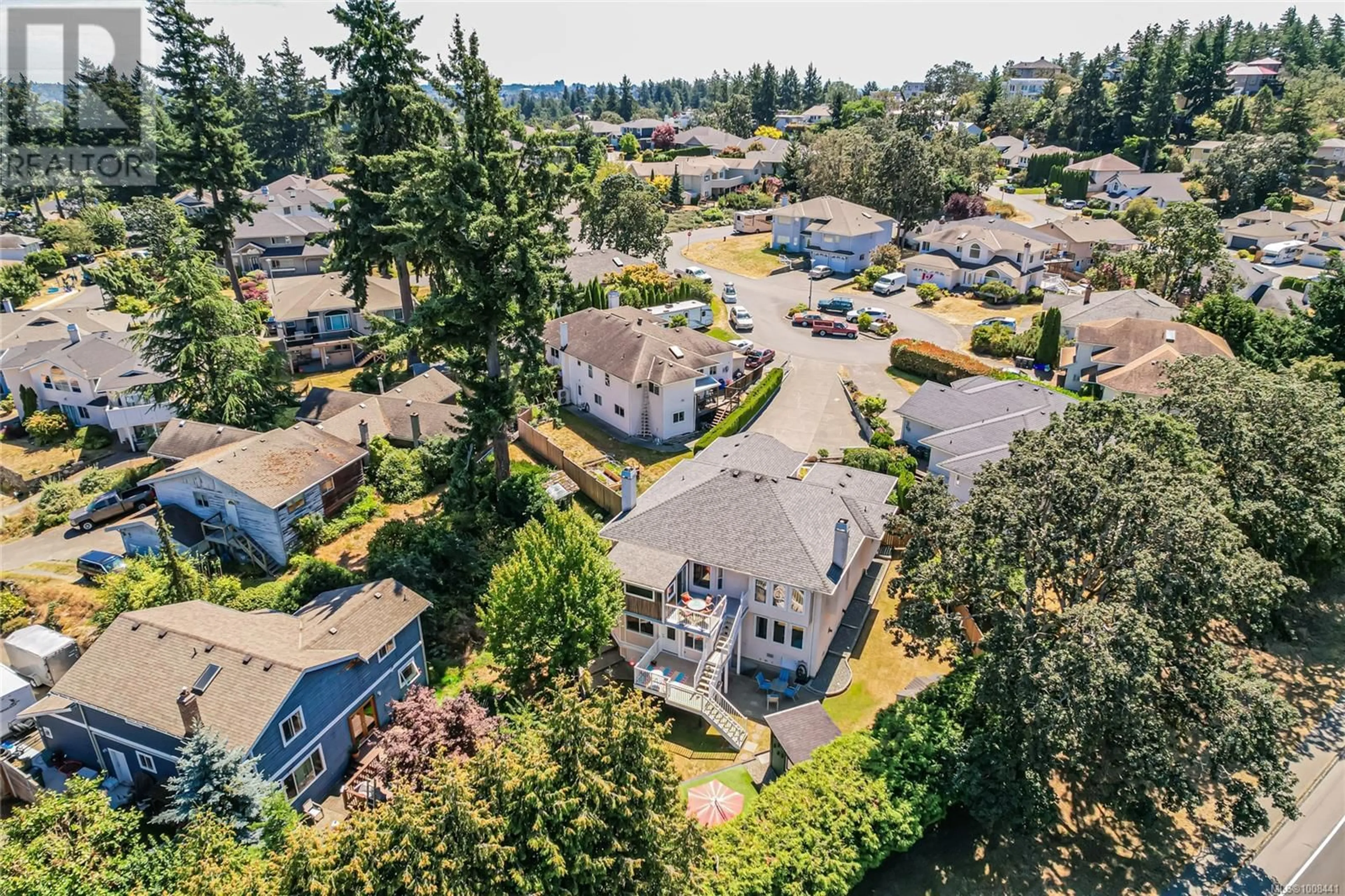 A pic from outside/outdoor area/front of a property/back of a property/a pic from drone, street for 1294 CARMICHAEL COURT, Saanich British Columbia V8Z7B9