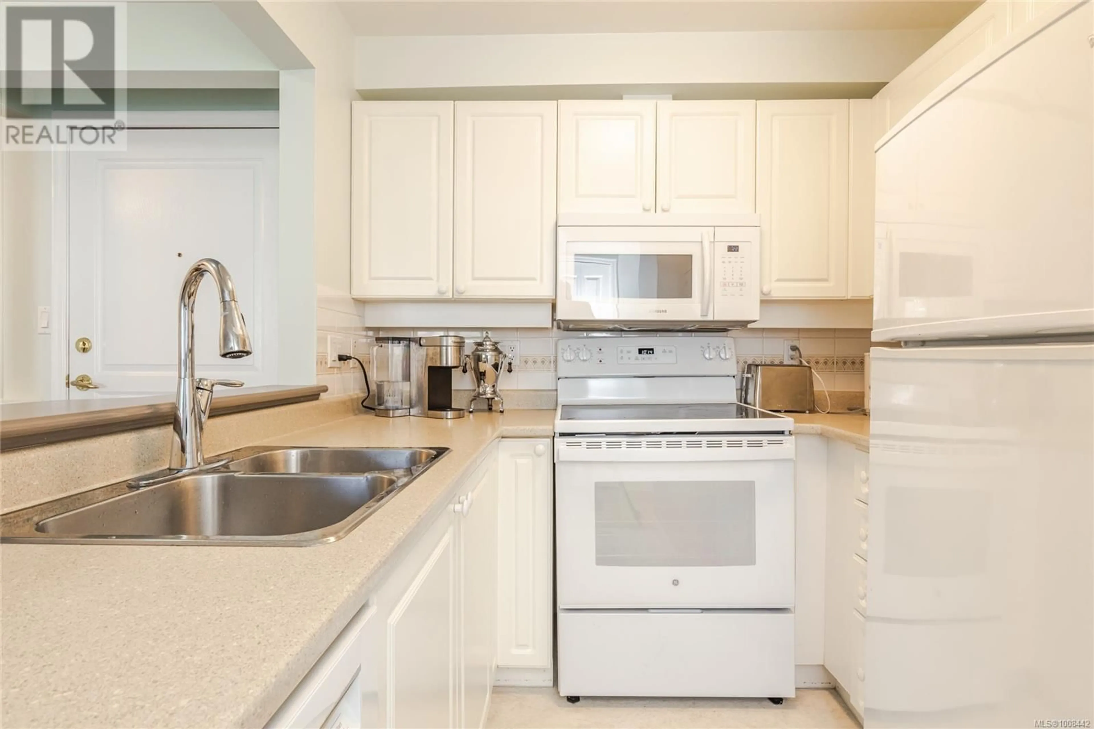 Standard kitchen, ceramic/tile floor for 308 - 5650 EDGEWATER LANE, Nanaimo British Columbia V9T6K1