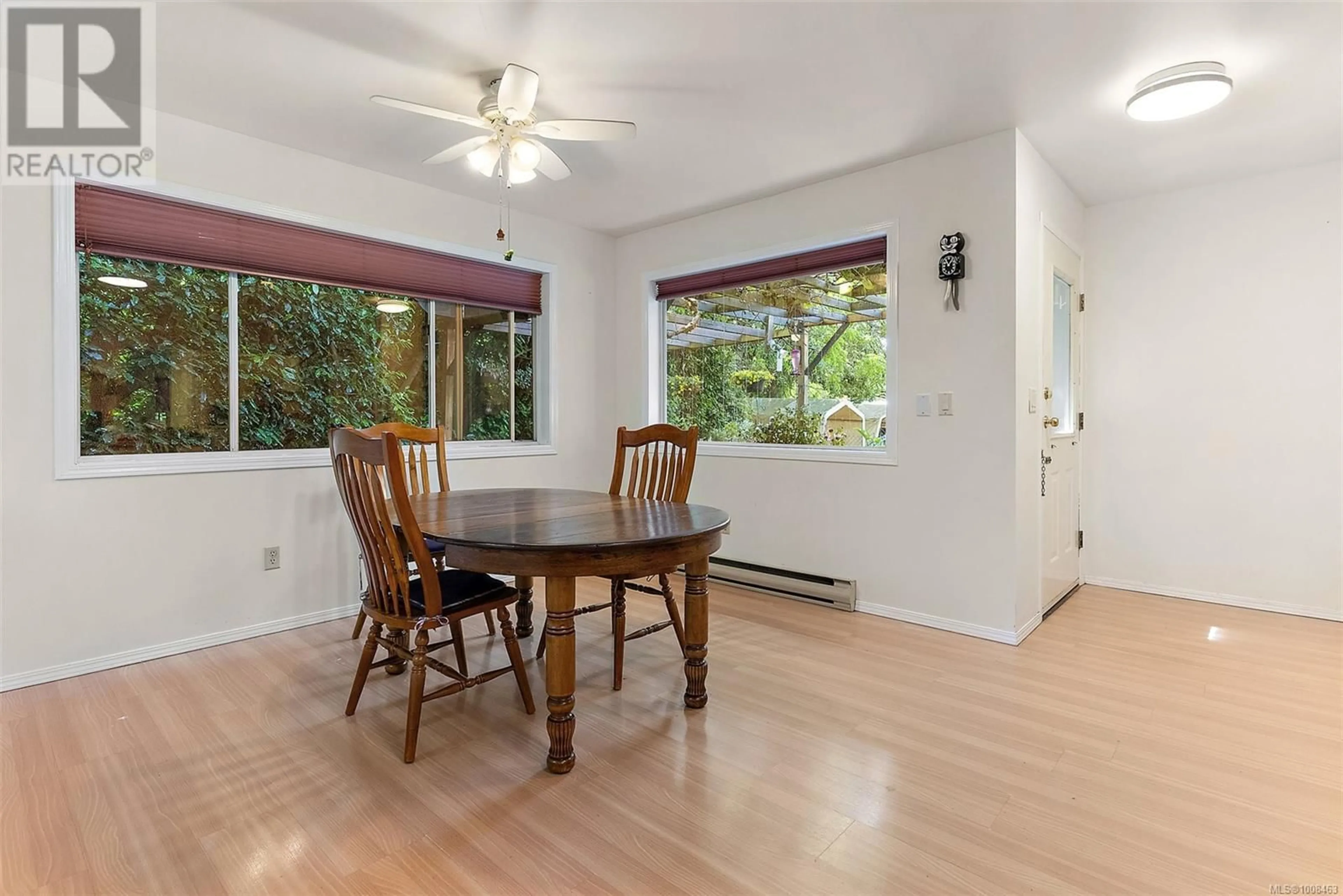 Dining room, wood/laminate floor for 4607 WEST SAANICH ROAD, Saanich British Columbia V8Z3G7
