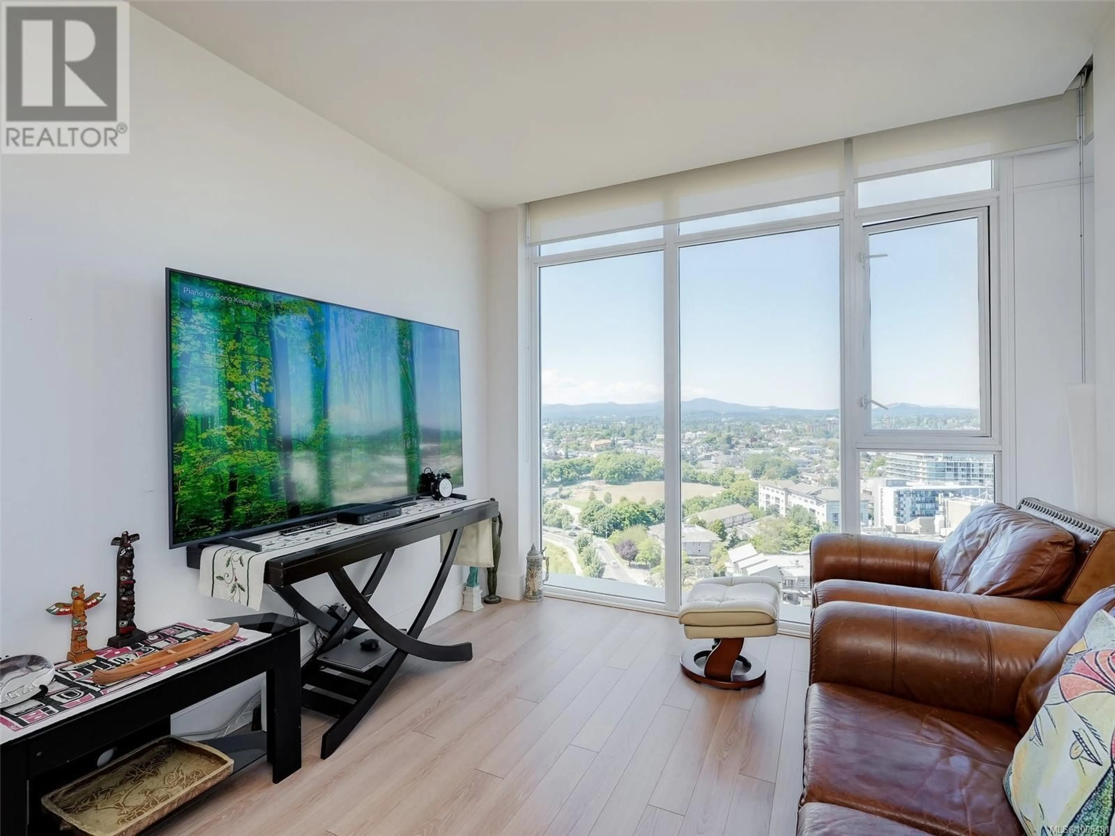 Living room with furniture, wood/laminate floor for 1705 - 83 SAGHALIE ROAD, Victoria British Columbia V9A0E7