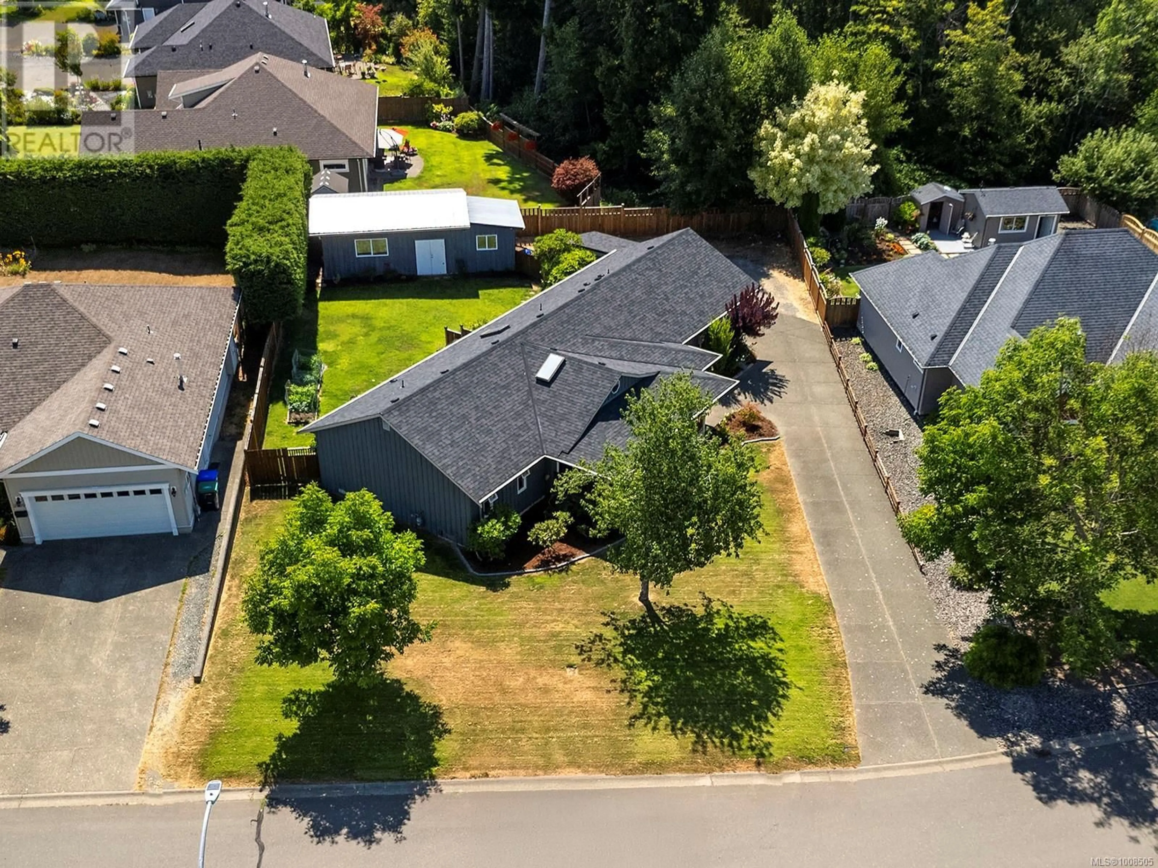 A pic from outside/outdoor area/front of a property/back of a property/a pic from drone, street for 2695 CARSTAIRS DRIVE, Courtenay British Columbia V9N4A3