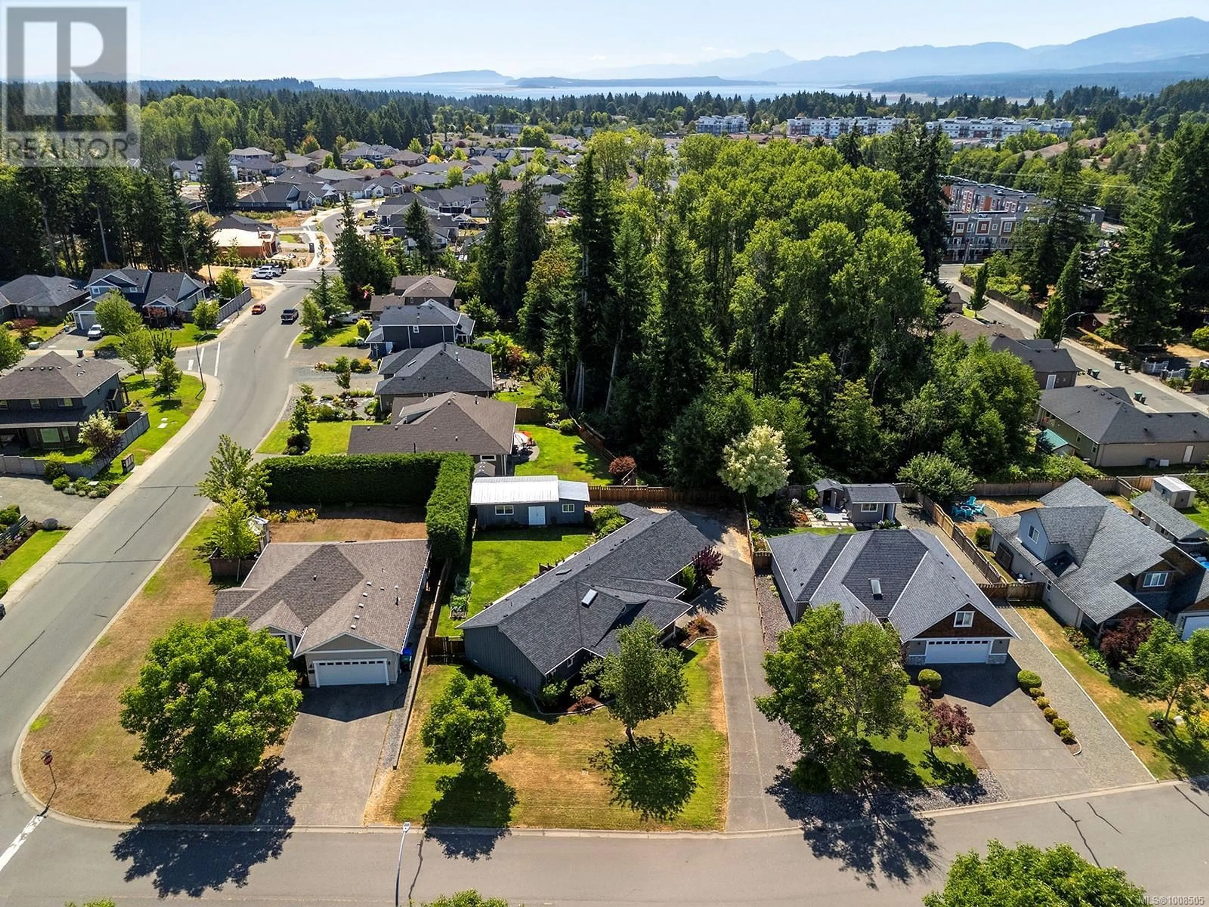 A pic from outside/outdoor area/front of a property/back of a property/a pic from drone, water/lake/river/ocean view for 2695 CARSTAIRS DRIVE, Courtenay British Columbia V9N4A3
