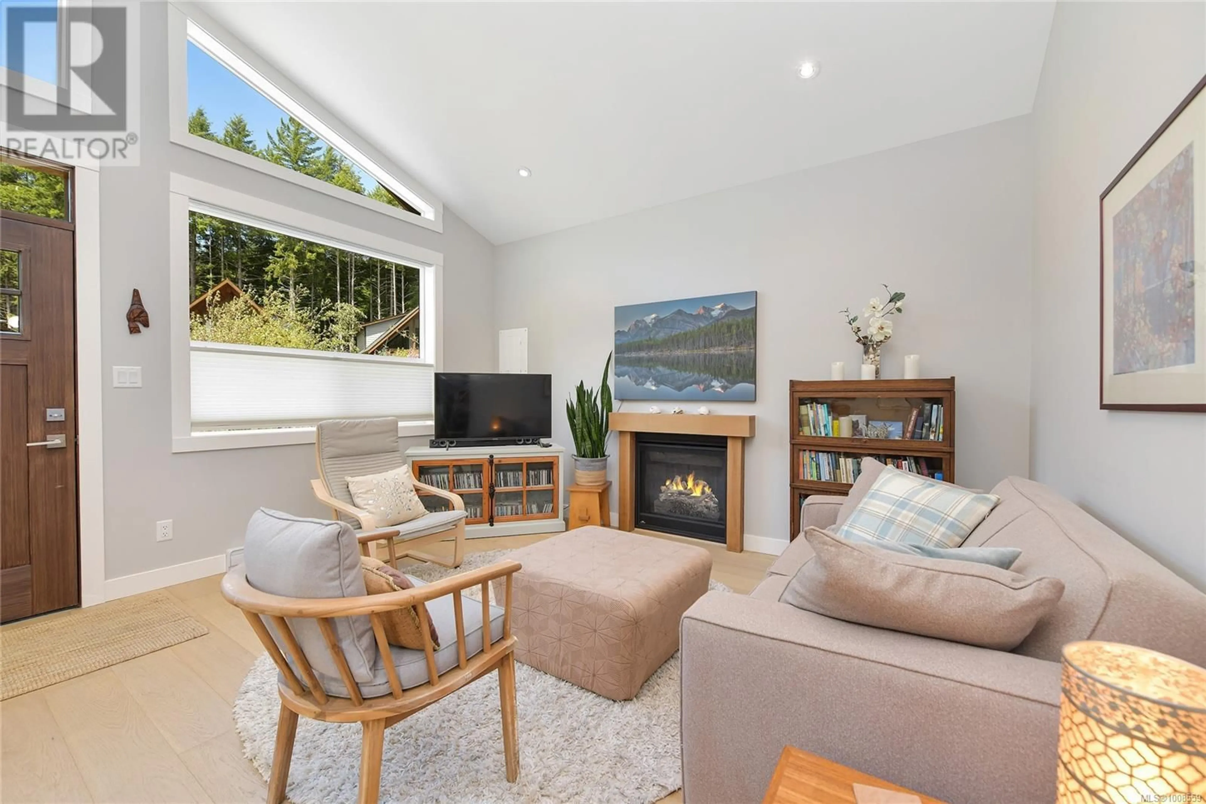 Living room with furniture, wood/laminate floor for 3822 TRAILHEAD DRIVE, Sooke British Columbia V9Z1L1