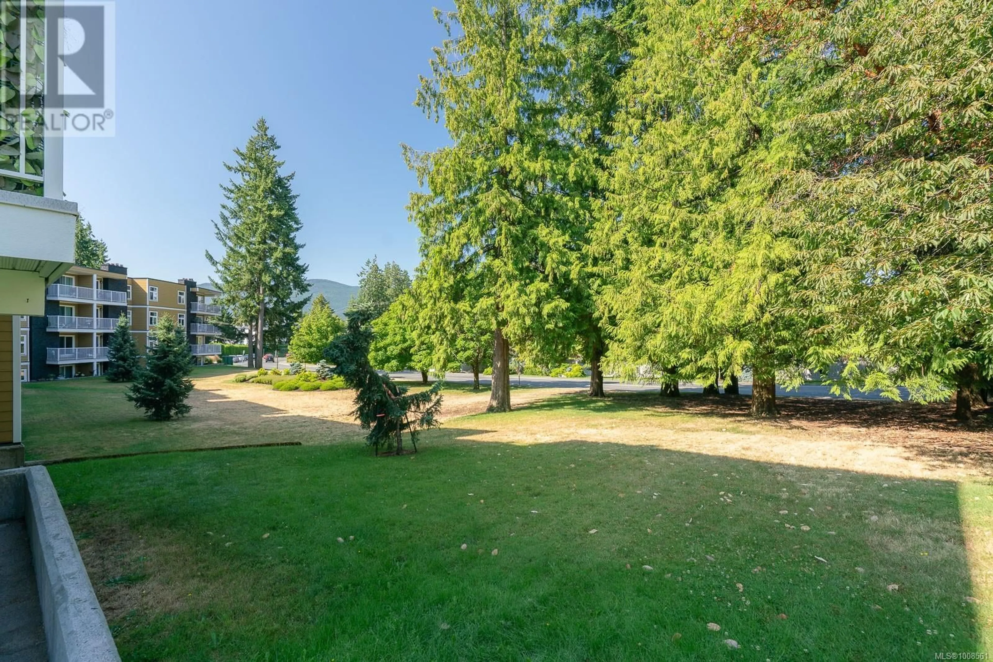 A pic from outside/outdoor area/front of a property/back of a property/a pic from drone, forest/trees view for 307 - 3270 ROSS ROAD, Nanaimo British Columbia V9T5J1