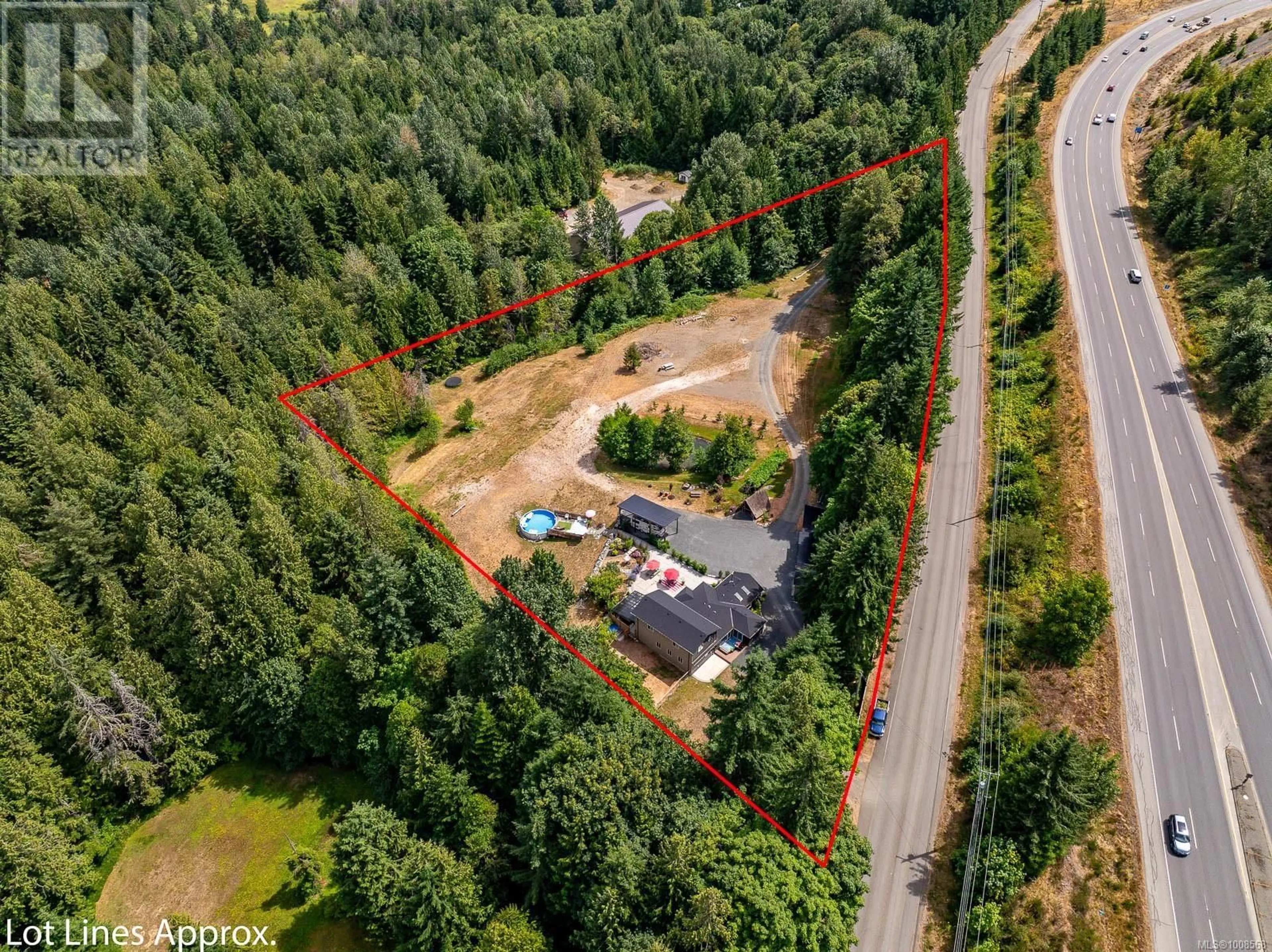 A pic from outside/outdoor area/front of a property/back of a property/a pic from drone, forest/trees view for 3840 SMALL ROAD, Courtenay British Columbia V9N3Z8