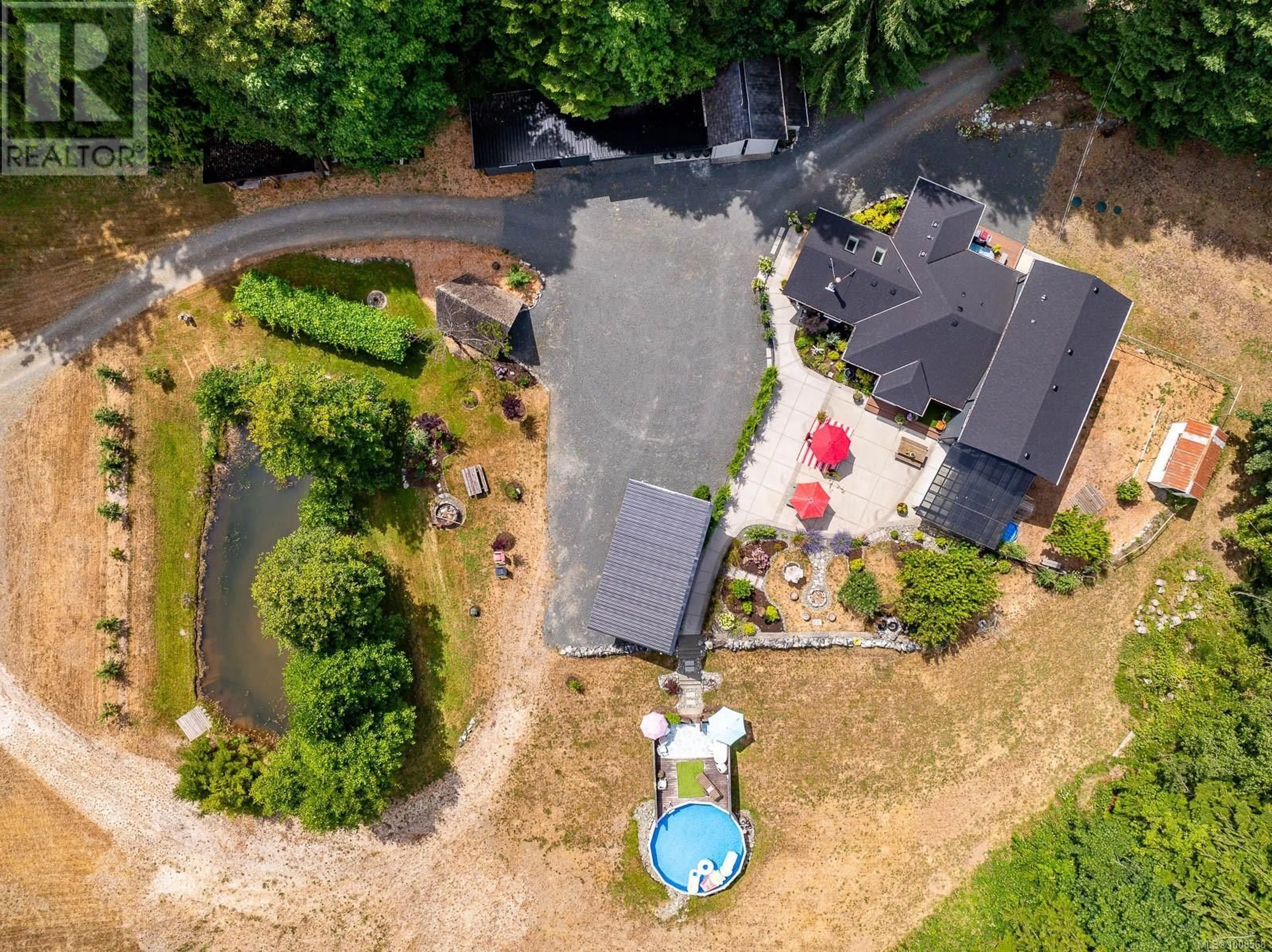A pic from outside/outdoor area/front of a property/back of a property/a pic from drone, unknown for 3840 SMALL ROAD, Courtenay British Columbia V9N3Z8