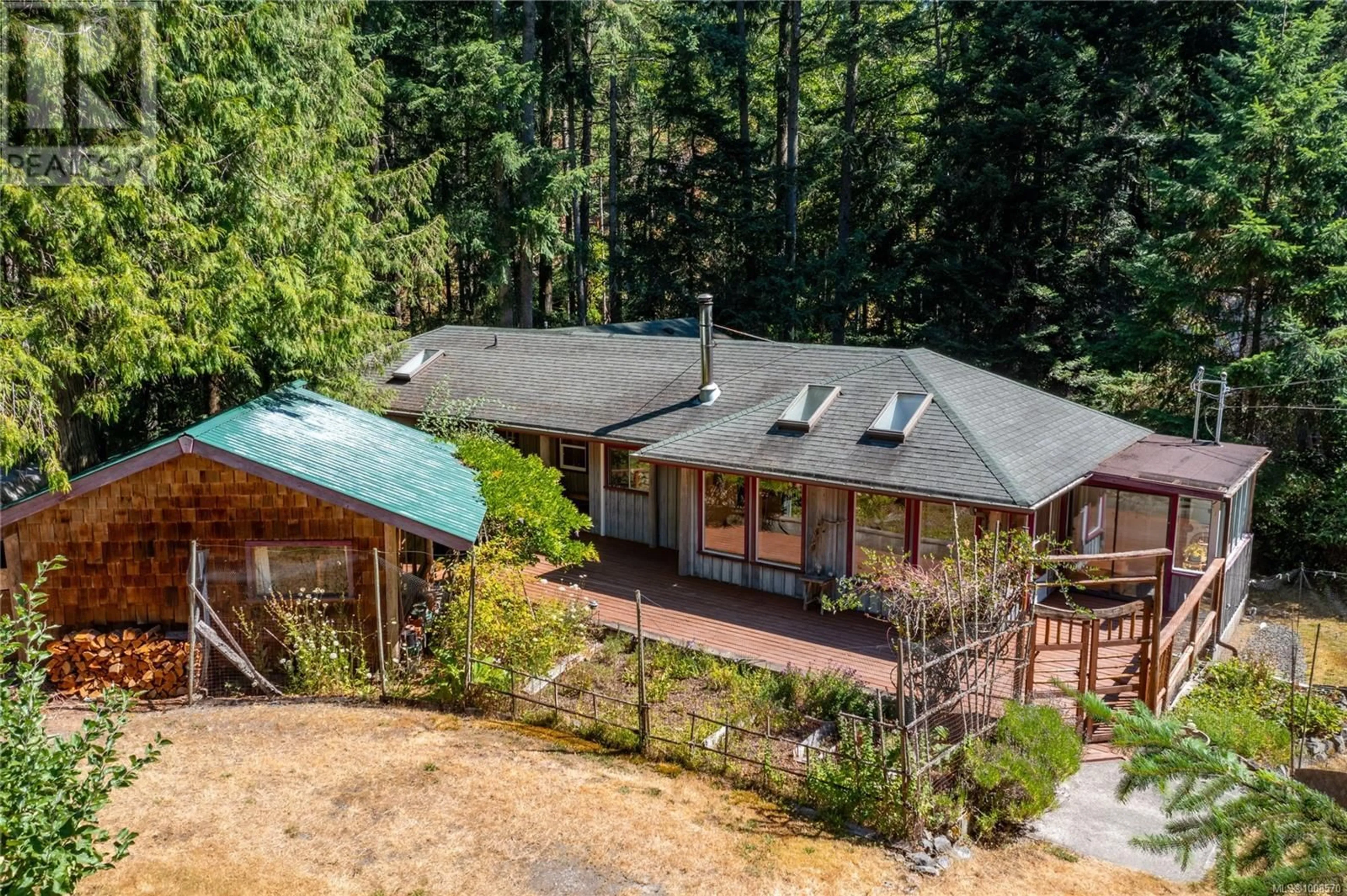 A pic from outside/outdoor area/front of a property/back of a property/a pic from drone, forest/trees view for 3708 STARBOARD CRESCENT, Pender Island British Columbia V0N2M0