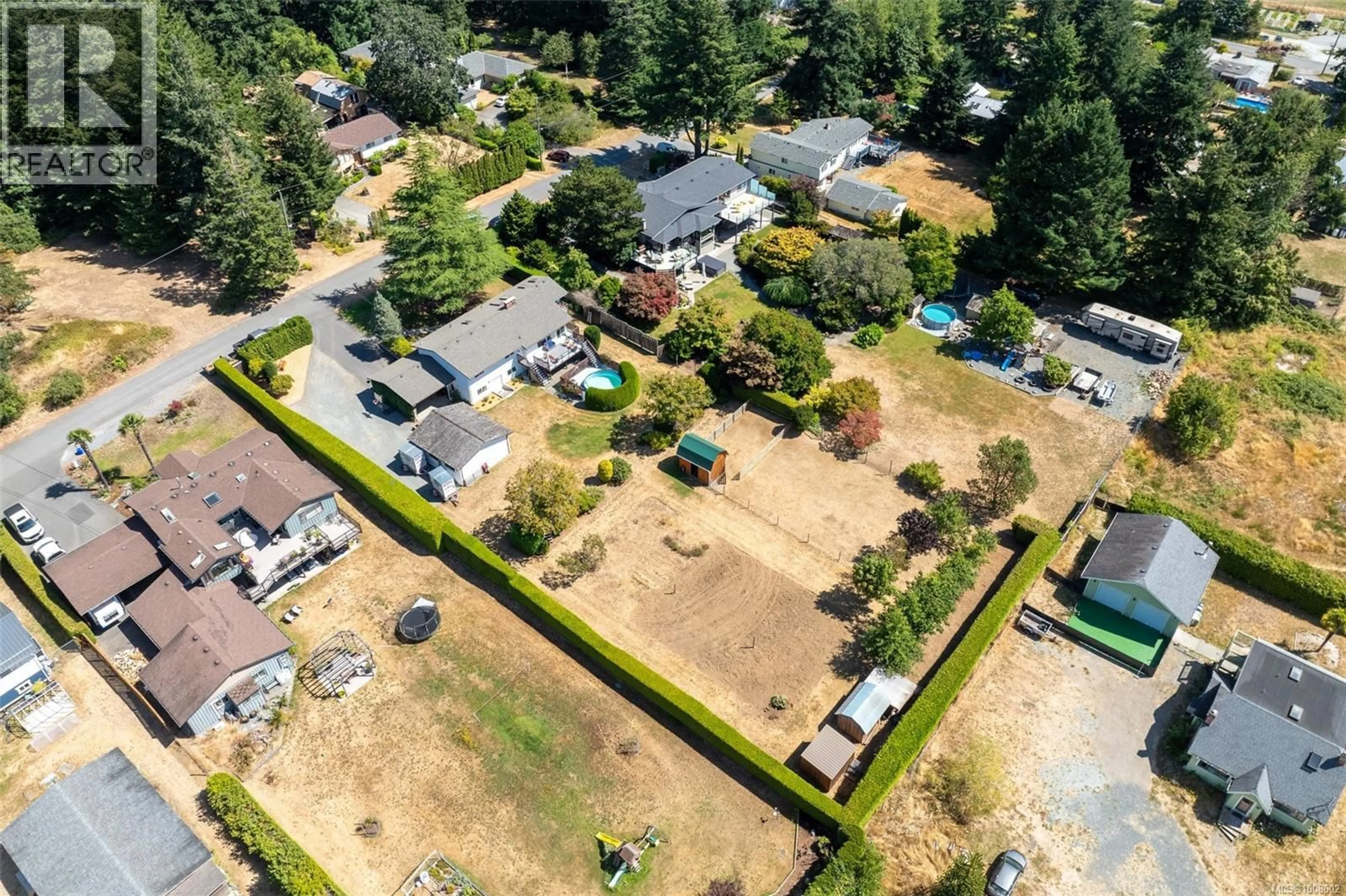 A pic from outside/outdoor area/front of a property/back of a property/a pic from drone, street for 1923 NICHOLAS ROAD, Central Saanich British Columbia V8M1X8