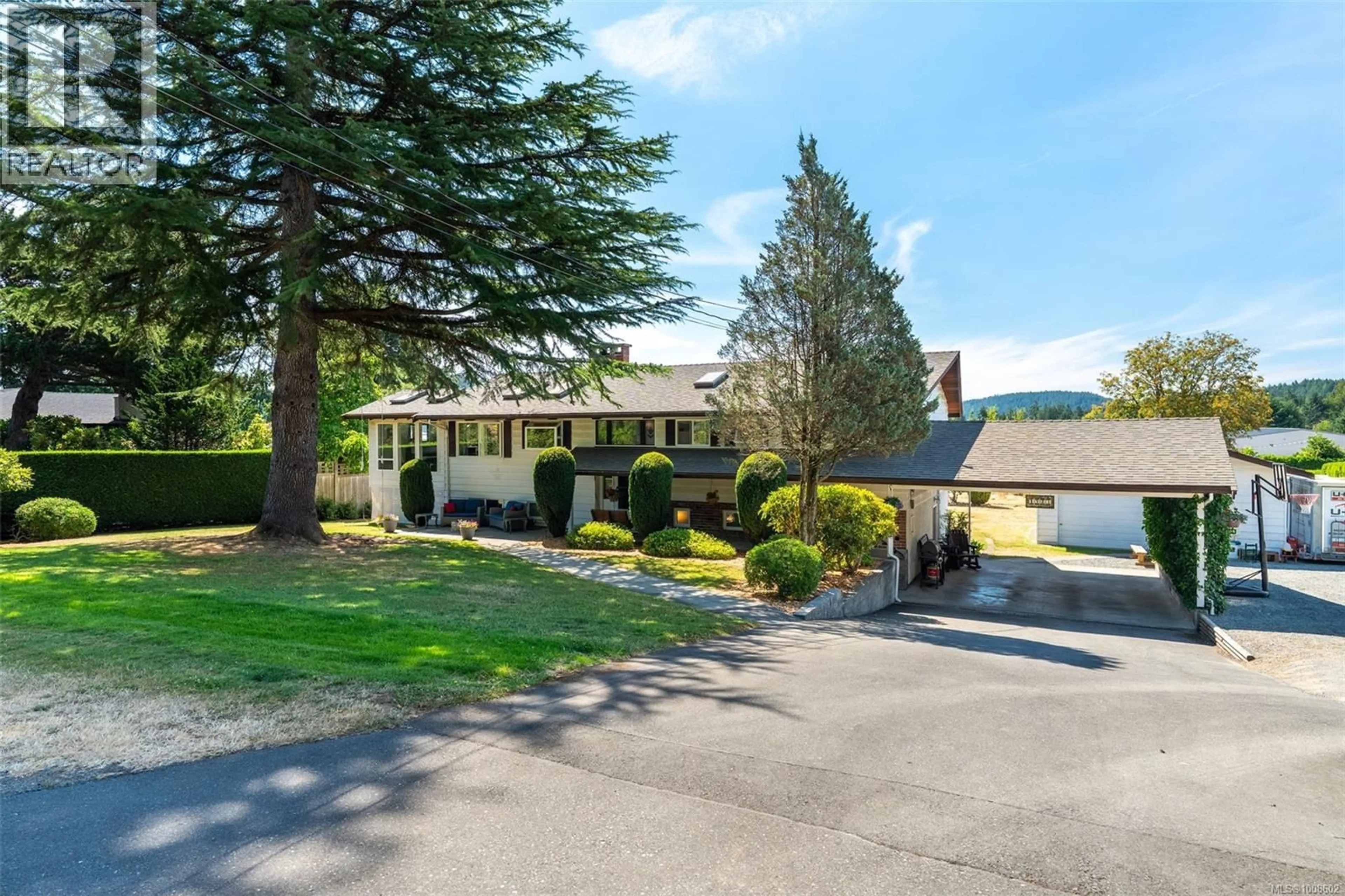 A pic from outside/outdoor area/front of a property/back of a property/a pic from drone, street for 1923 NICHOLAS ROAD, Central Saanich British Columbia V8M1X8