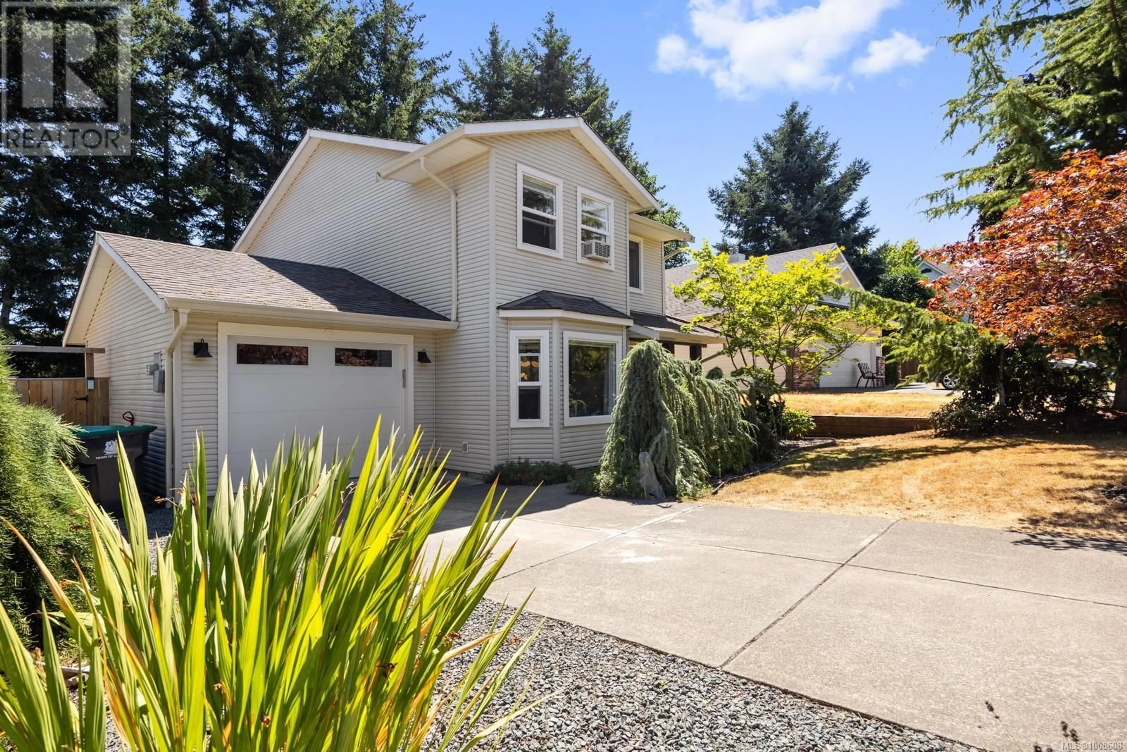 Home with vinyl exterior material, street for 1273 NOEL AVENUE, Comox British Columbia V9N4A3