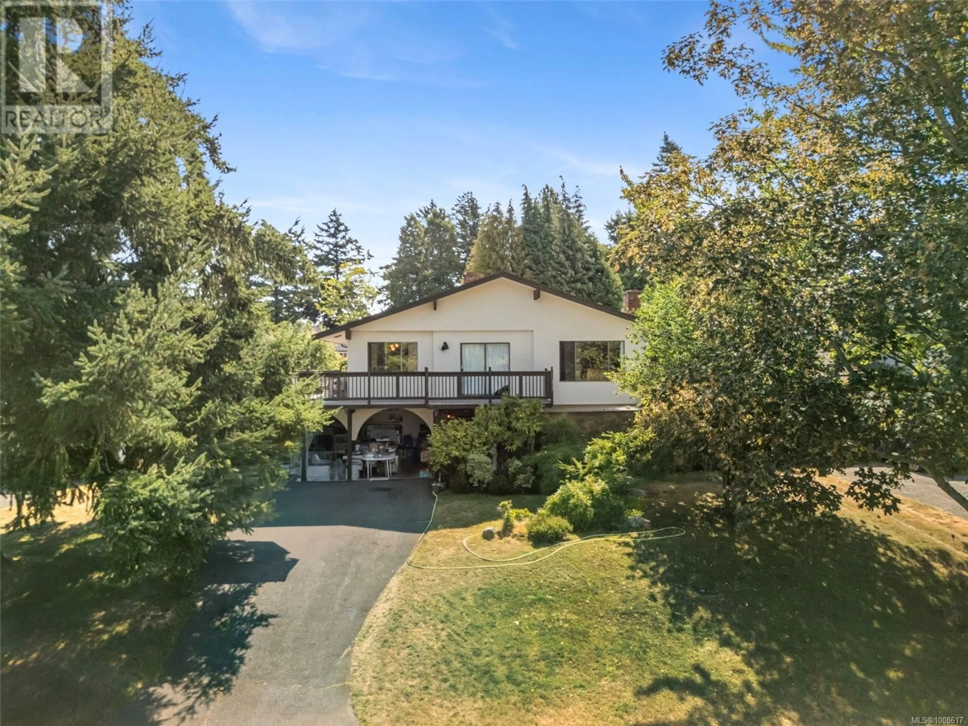 A pic from outside/outdoor area/front of a property/back of a property/a pic from drone, unknown for 4461 TREMBLAY DRIVE, Saanich British Columbia V8N4W7
