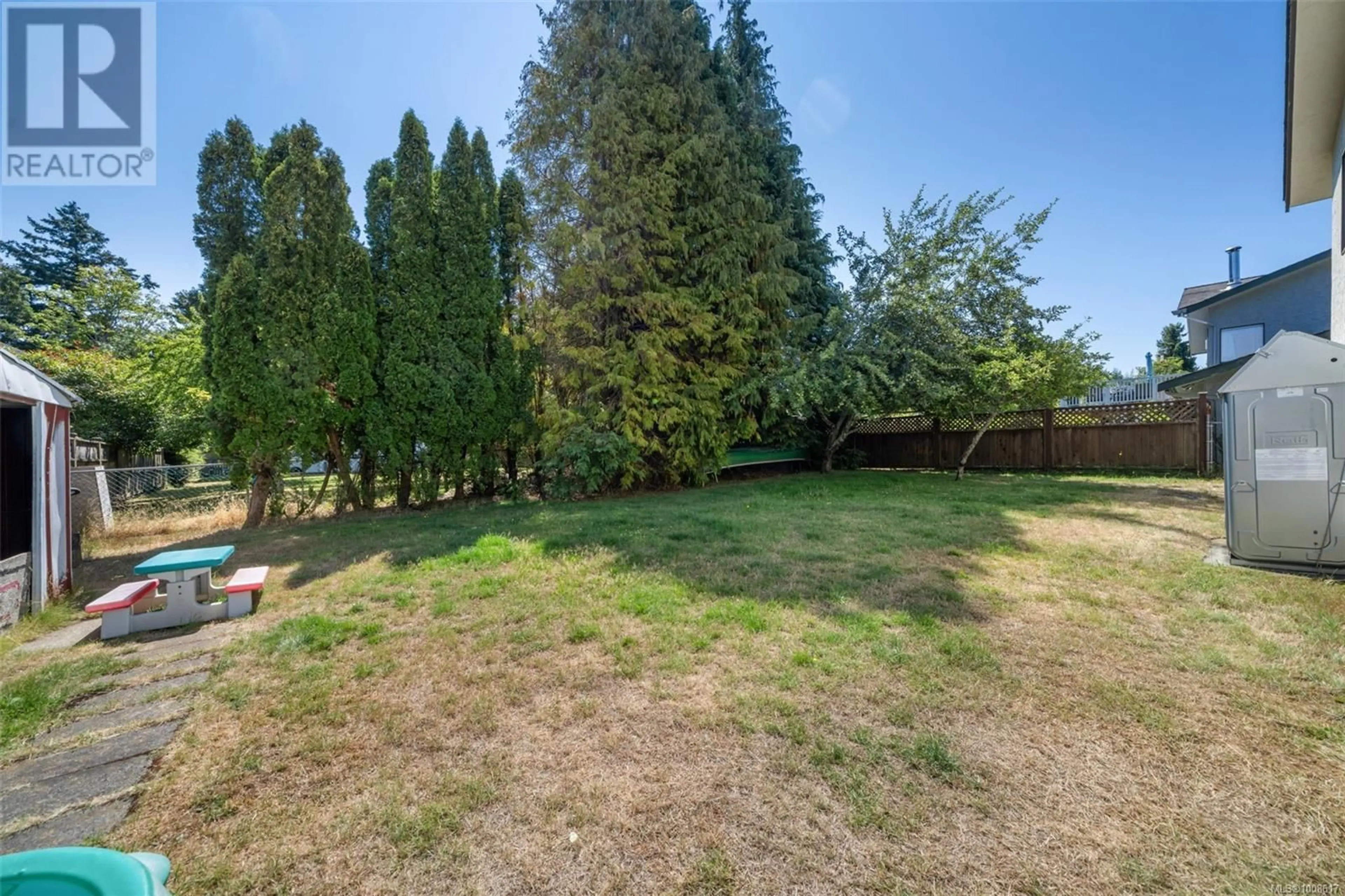 A pic from outside/outdoor area/front of a property/back of a property/a pic from drone, forest/trees view for 4461 TREMBLAY DRIVE, Saanich British Columbia V8N4W7