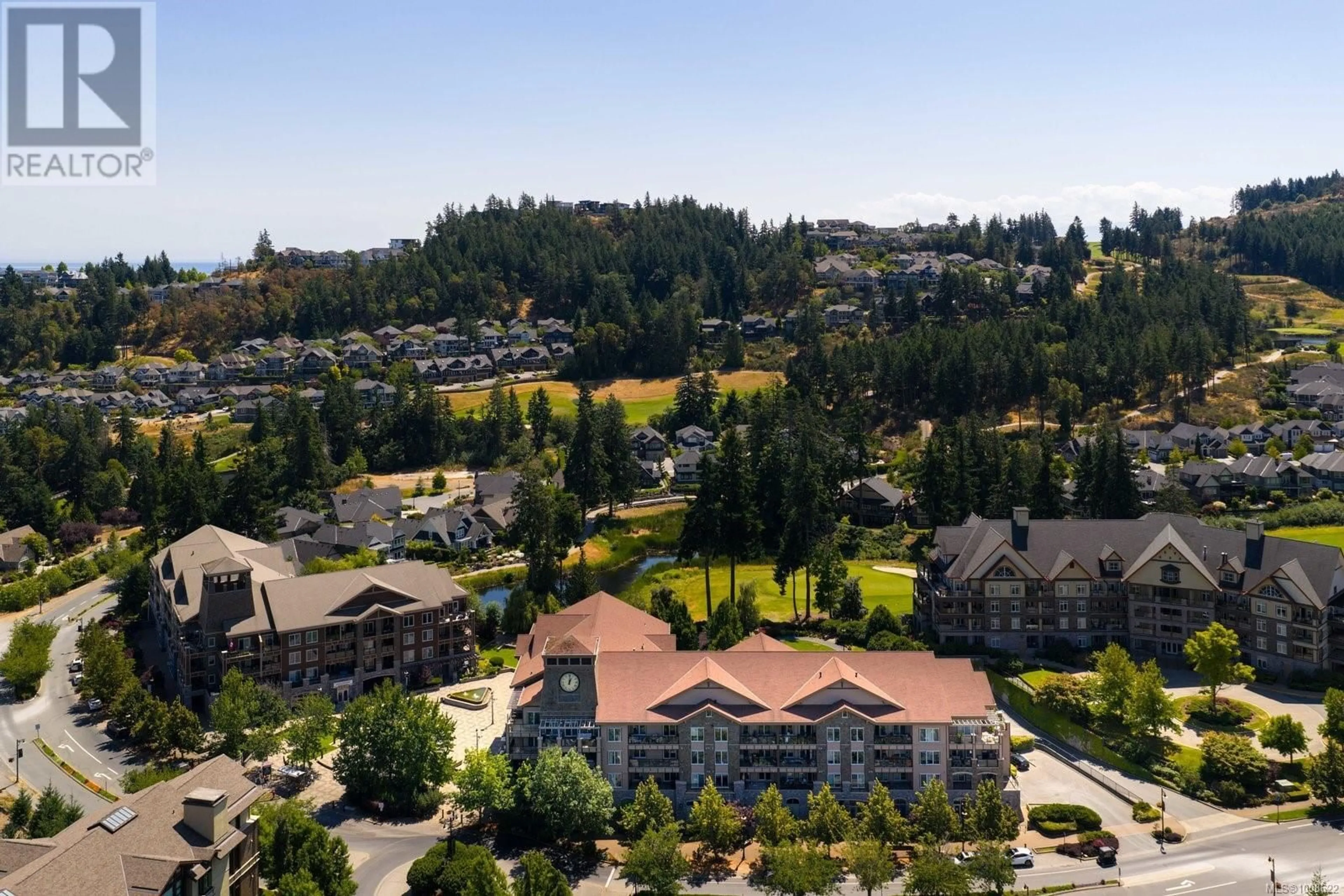 A pic from outside/outdoor area/front of a property/back of a property/a pic from drone, mountain view for 403 - 1335 BEAR MOUNTAIN PARKWAY, Langford British Columbia V9B6T9