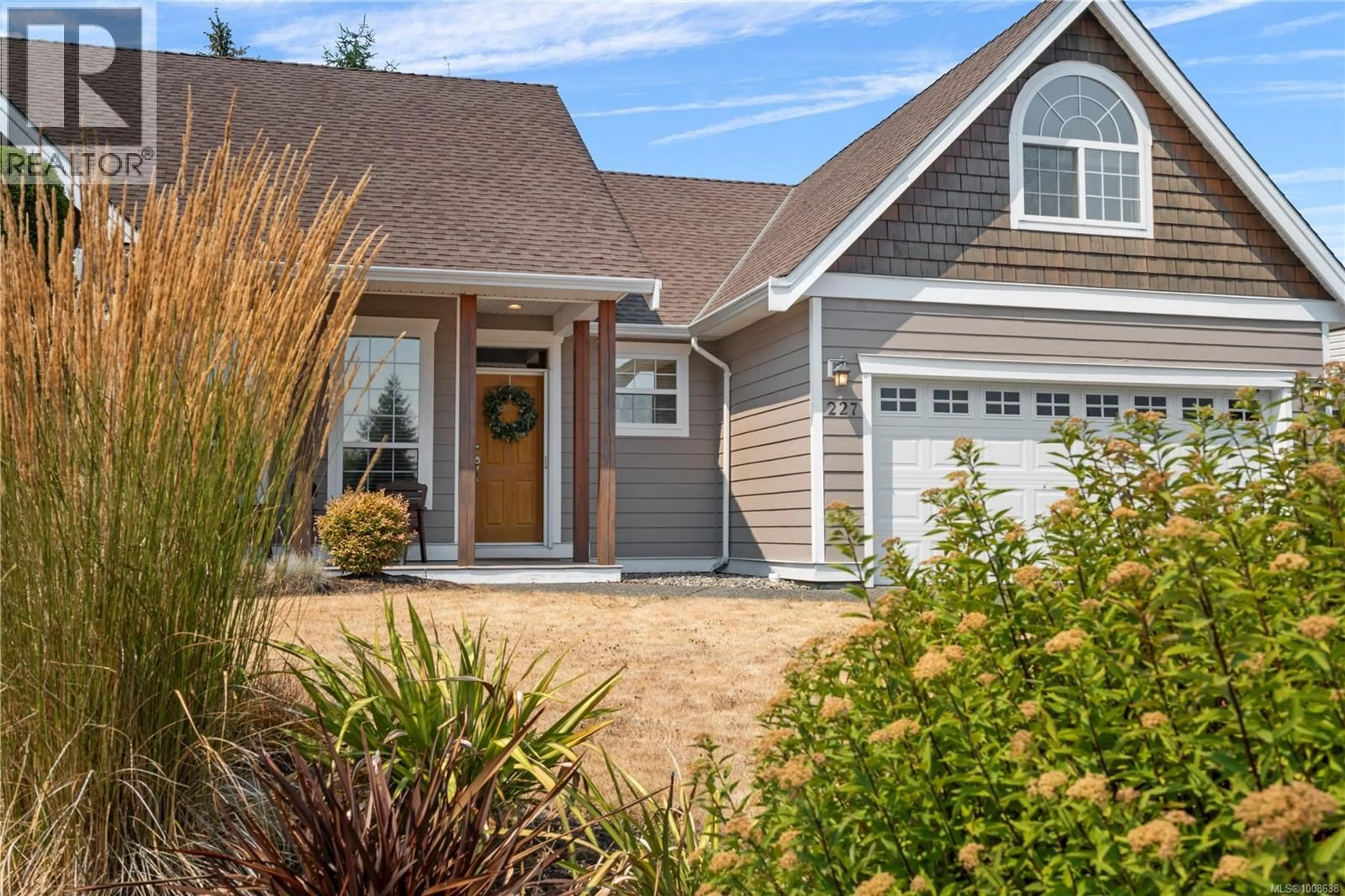 Home with vinyl exterior material, street for 227 LODGEPOLE DRIVE, Parksville British Columbia V9P2Z1