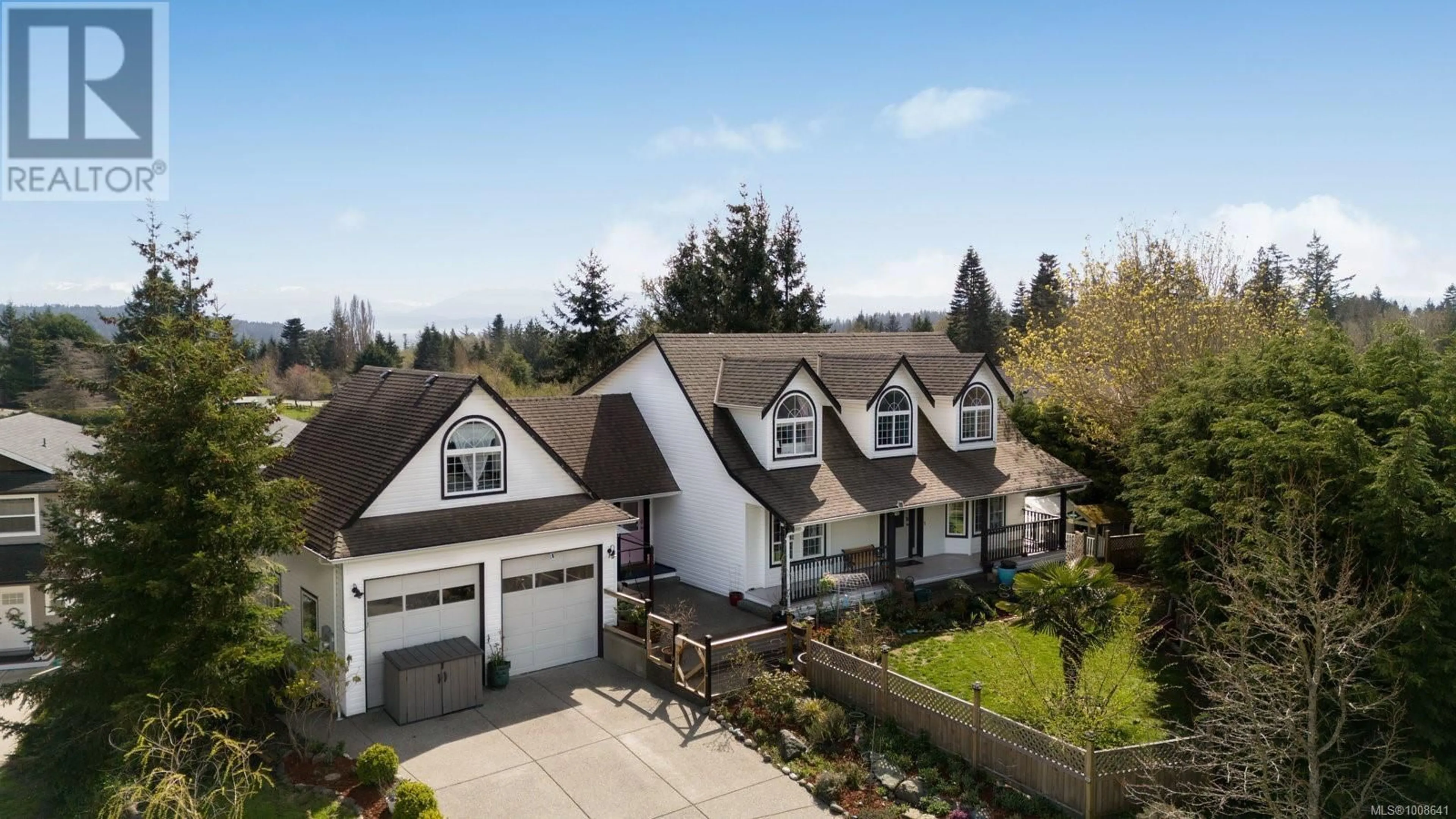 A pic from outside/outdoor area/front of a property/back of a property/a pic from drone, mountain view for 2048 STONE HEARTH LANE, Sooke British Columbia V0S1N0