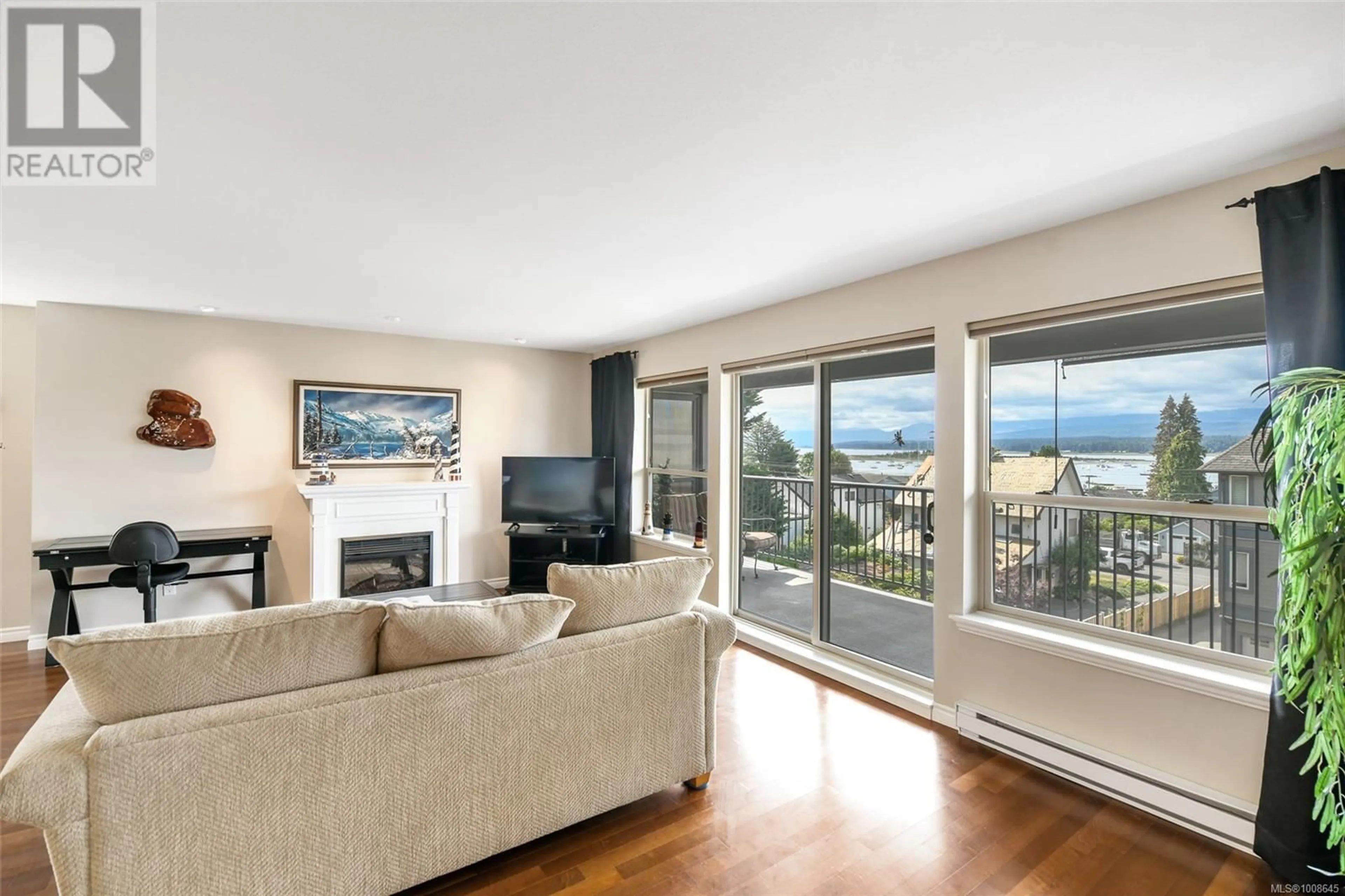 Living room with furniture, unknown for 301 - 1705 COMOX AVENUE, Comox British Columbia V9M3M1