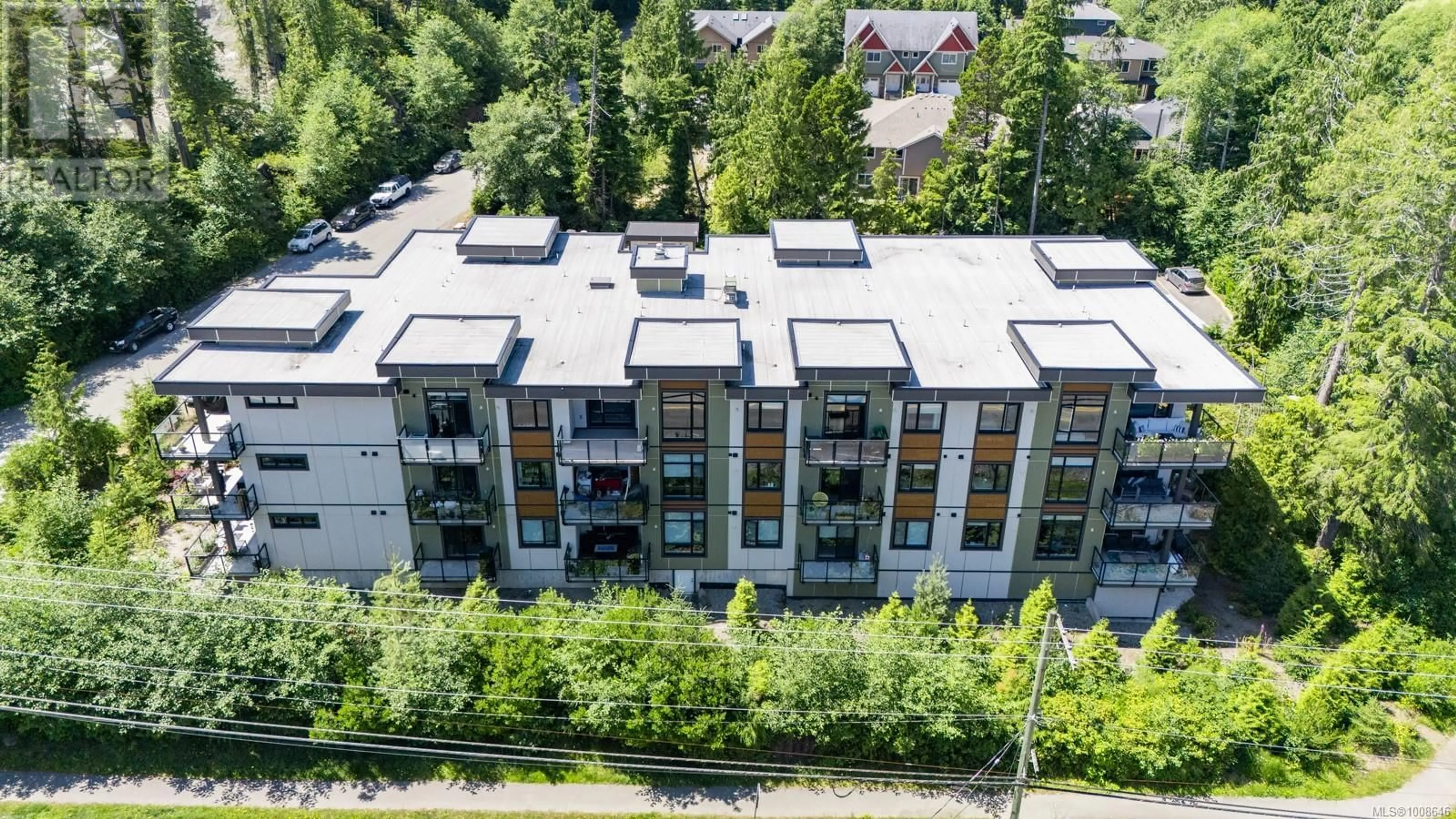 A pic from outside/outdoor area/front of a property/back of a property/a pic from drone, city buildings view from balcony for 206 - 700 YEW WOOD ROAD, Tofino British Columbia V0R2Z0