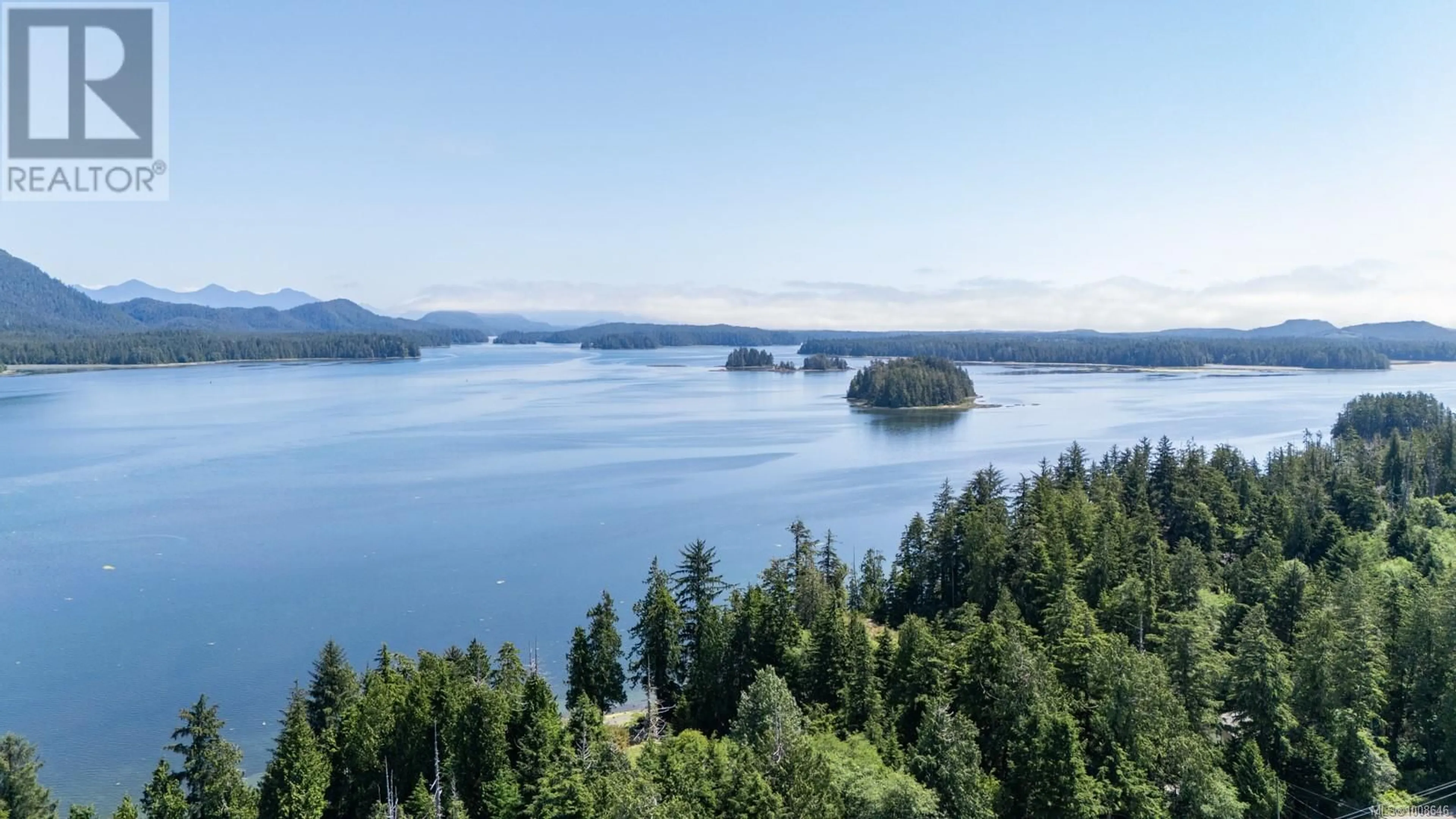 A pic from outside/outdoor area/front of a property/back of a property/a pic from drone, water/lake/river/ocean view for 206 - 700 YEW WOOD ROAD, Tofino British Columbia V0R2Z0