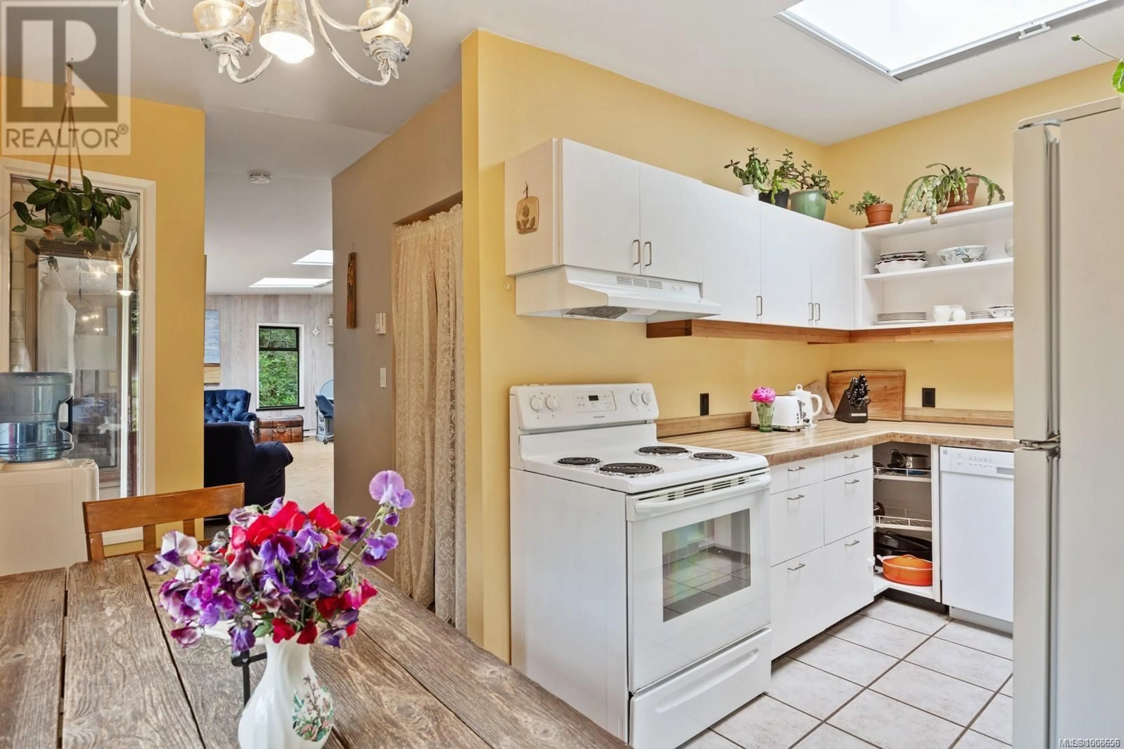 Open concept kitchen, ceramic/tile floor for 1100 MOUNT ROAD, Hornby Island British Columbia V0R1Z0