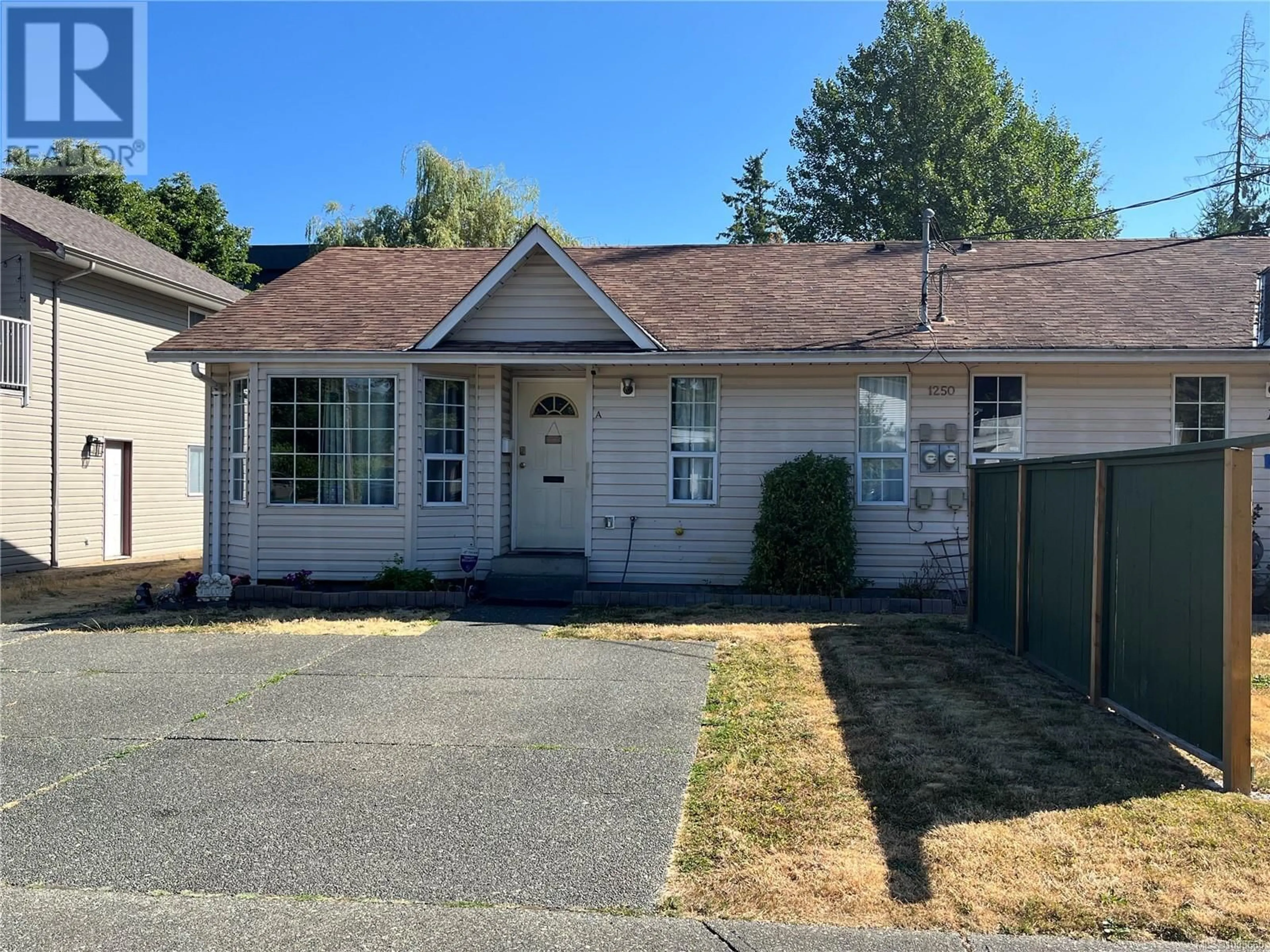 Home with vinyl exterior material, street for A - 1250 STEWART AVENUE, Courtenay British Columbia V9N3H4