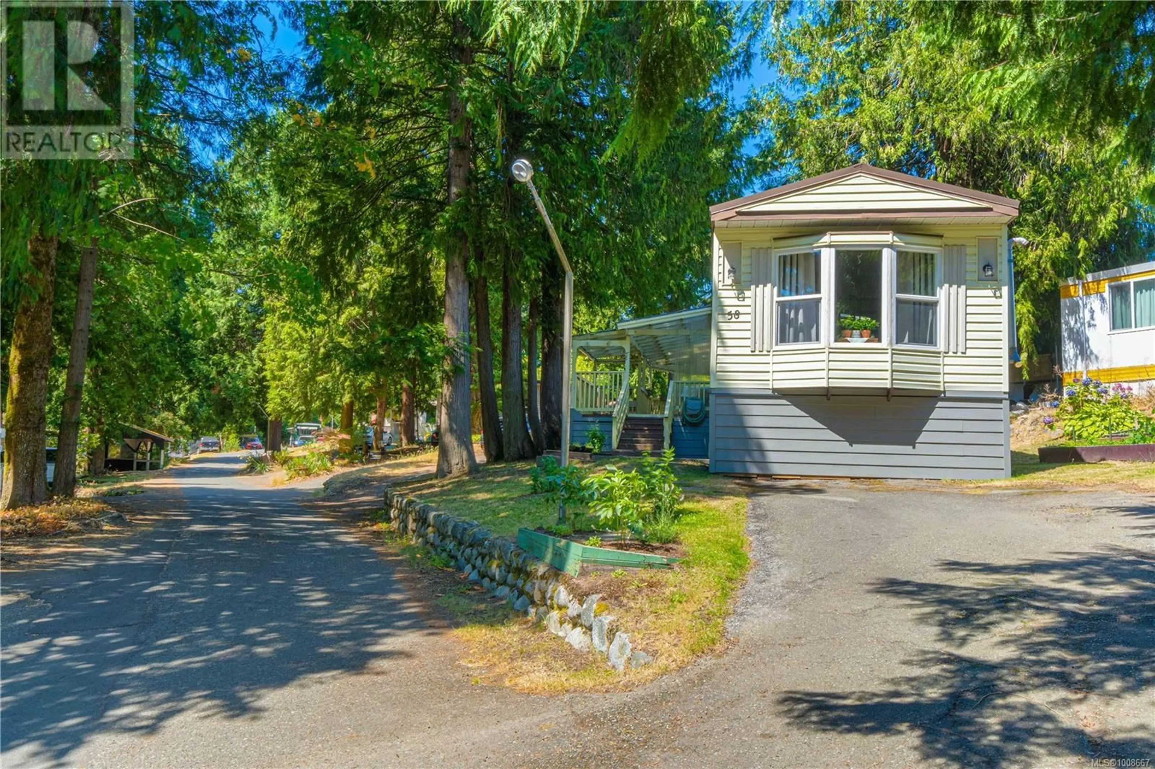 A pic from outside/outdoor area/front of a property/back of a property/a pic from drone, unknown for 58 - 1000 CHASE RIVER ROAD, Nanaimo British Columbia V9R6M1