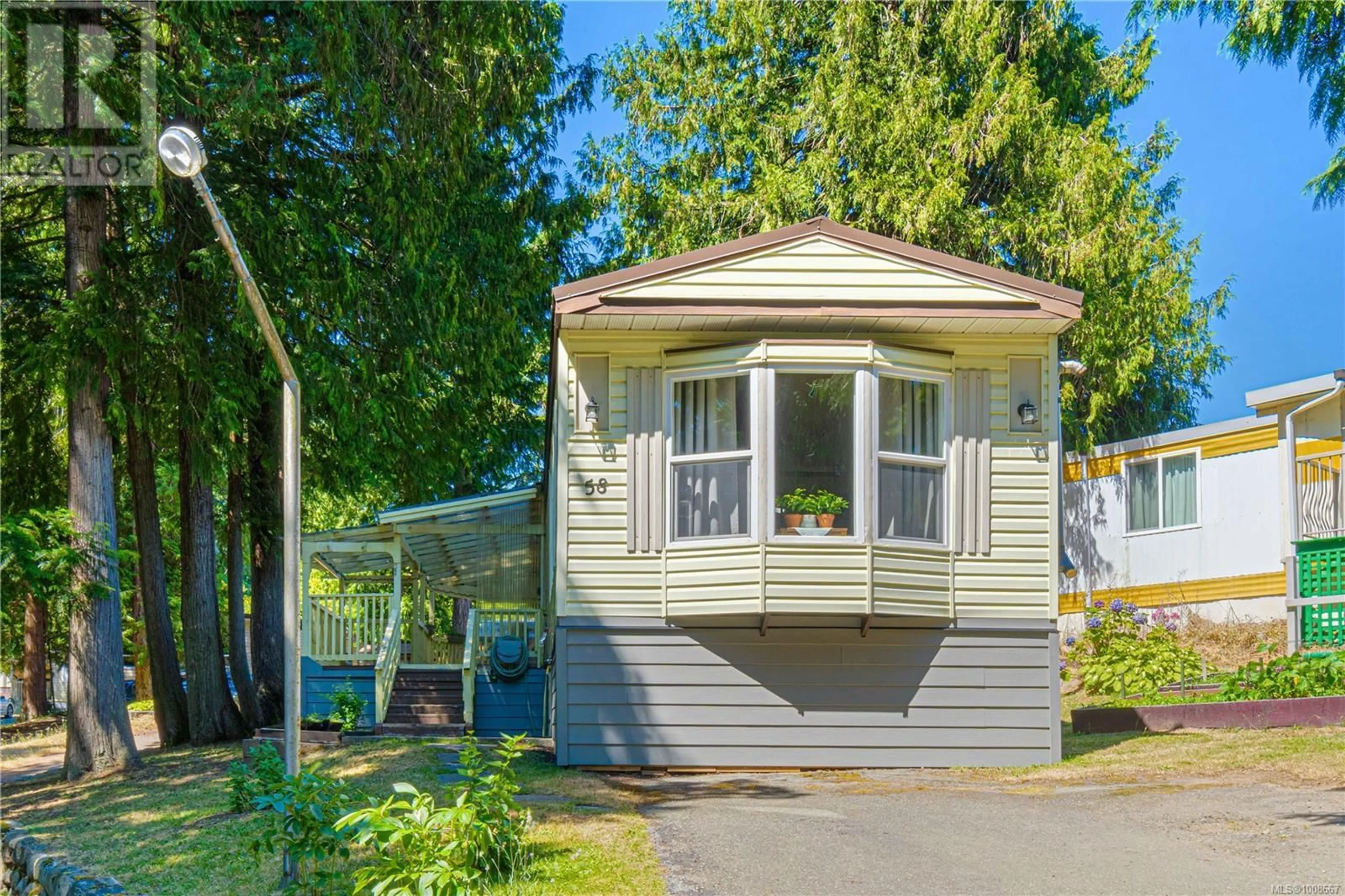 Home with vinyl exterior material, street for 58 - 1000 CHASE RIVER ROAD, Nanaimo British Columbia V9R6M1