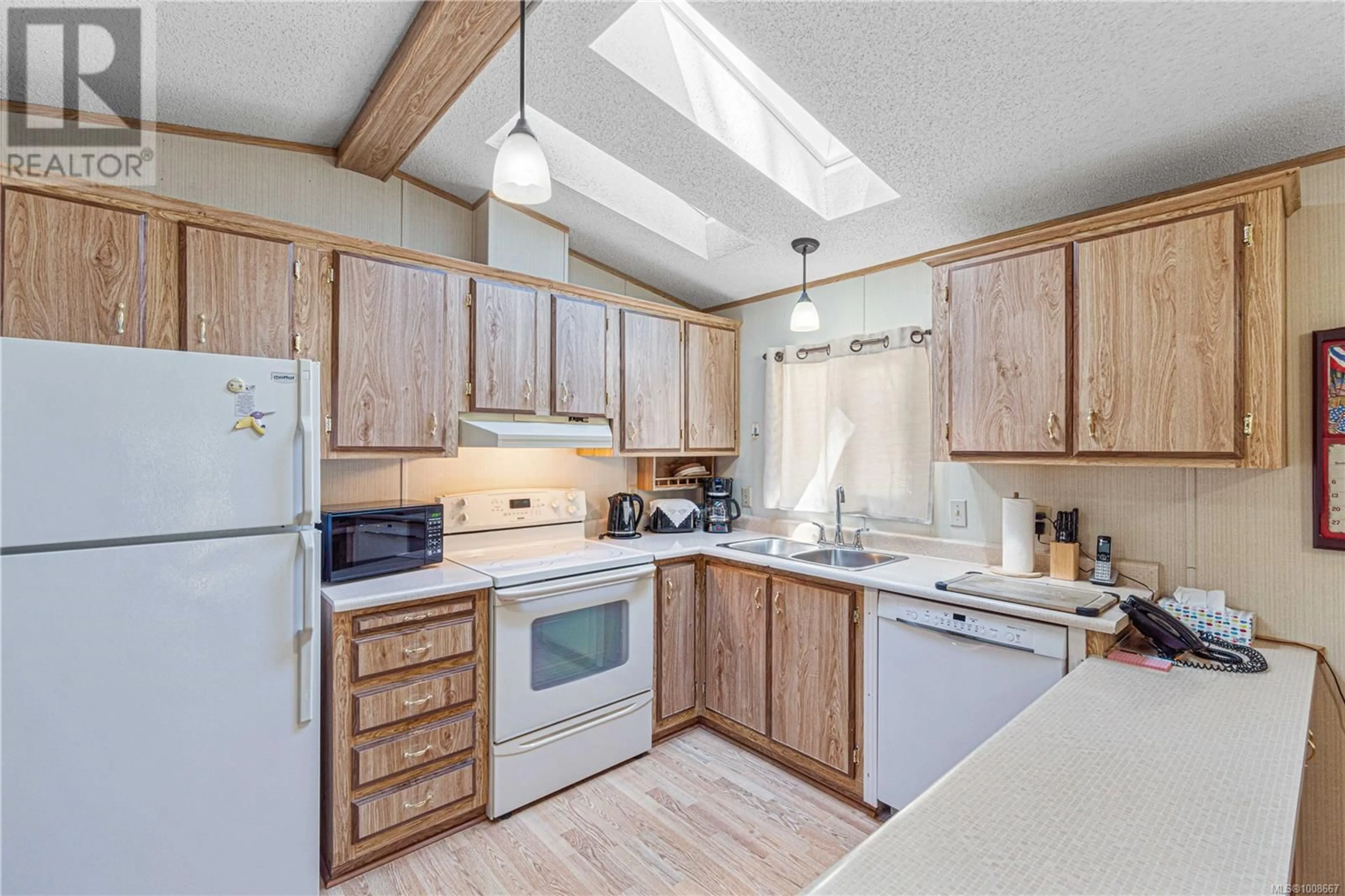 Standard kitchen, wood/laminate floor for 58 - 1000 CHASE RIVER ROAD, Nanaimo British Columbia V9R6M1