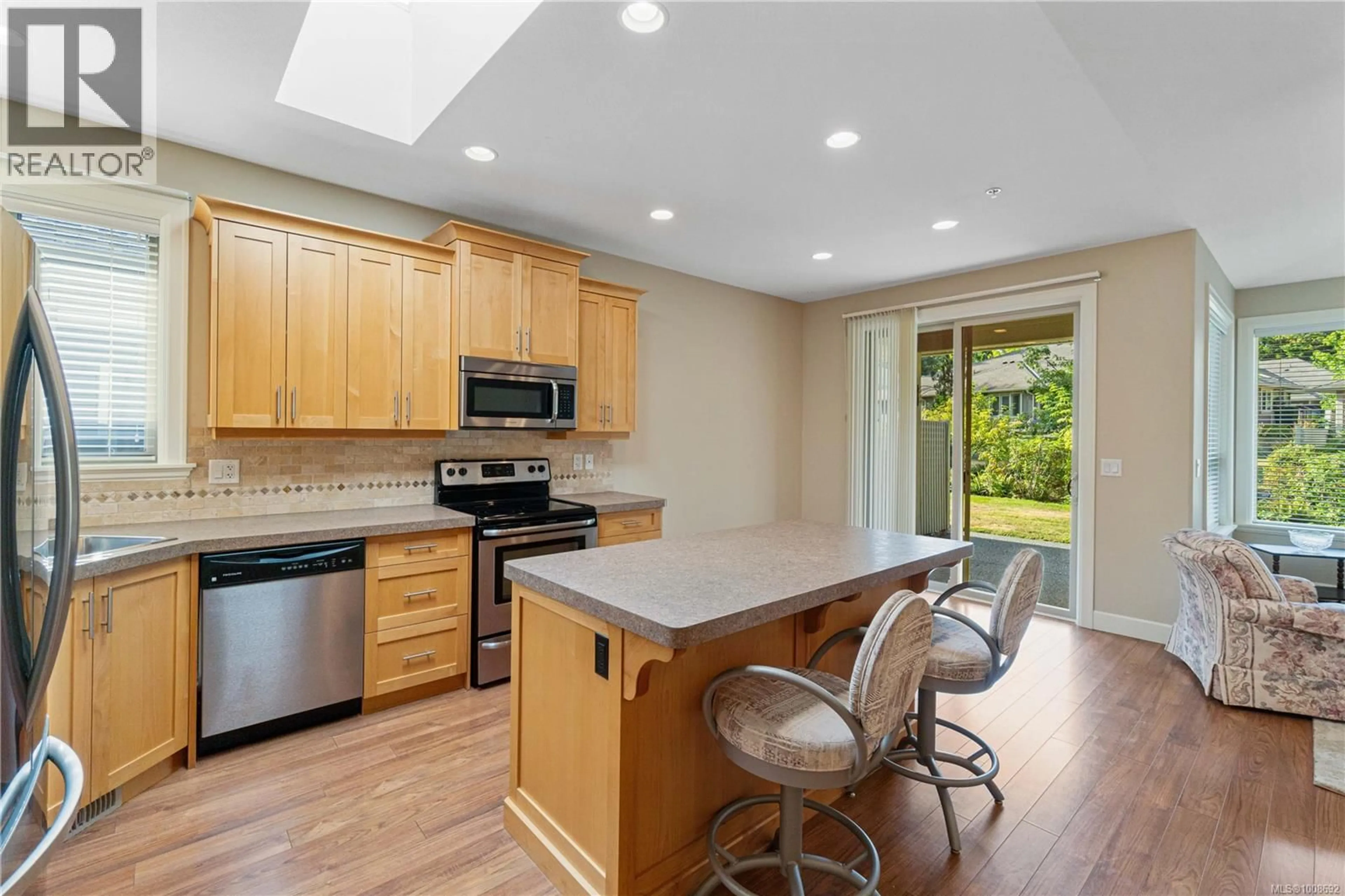Open concept kitchen, unknown for 102 - 4429 AMBLEWOOD LANE, Nanaimo British Columbia V9T6H5
